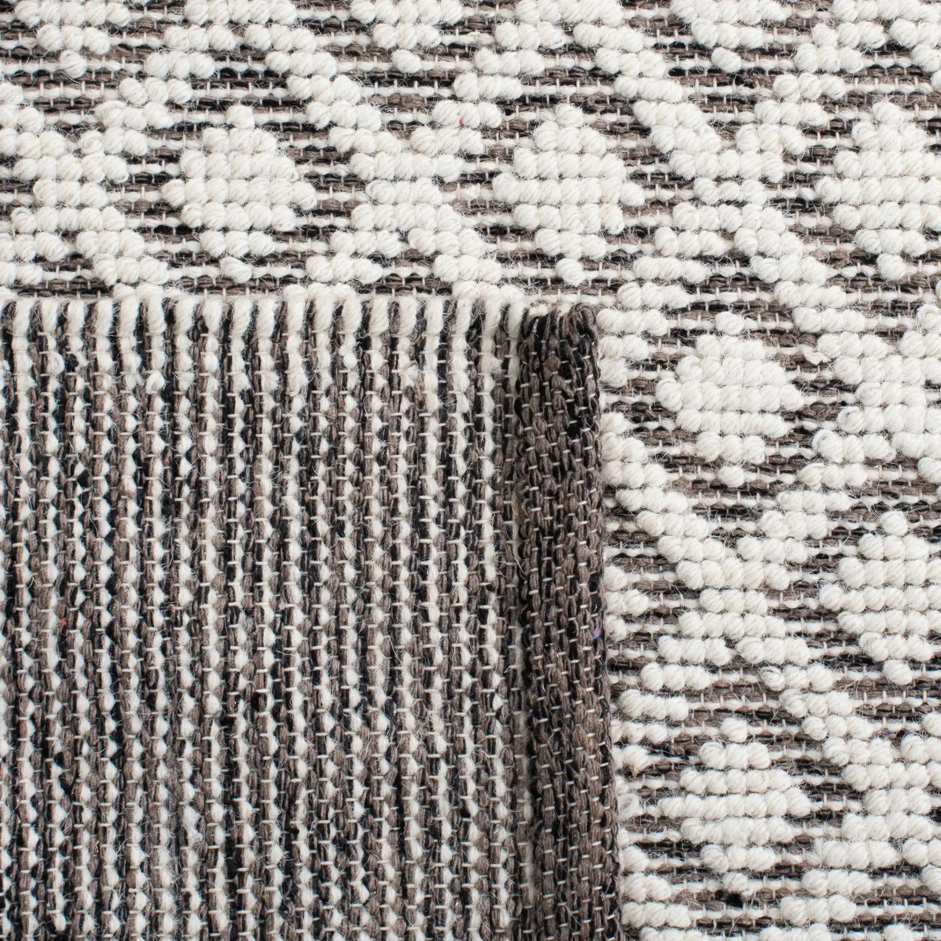 Vermont Diamond Lattice Hand-Woven Wool Rug in Ivory / Brown in a styled room