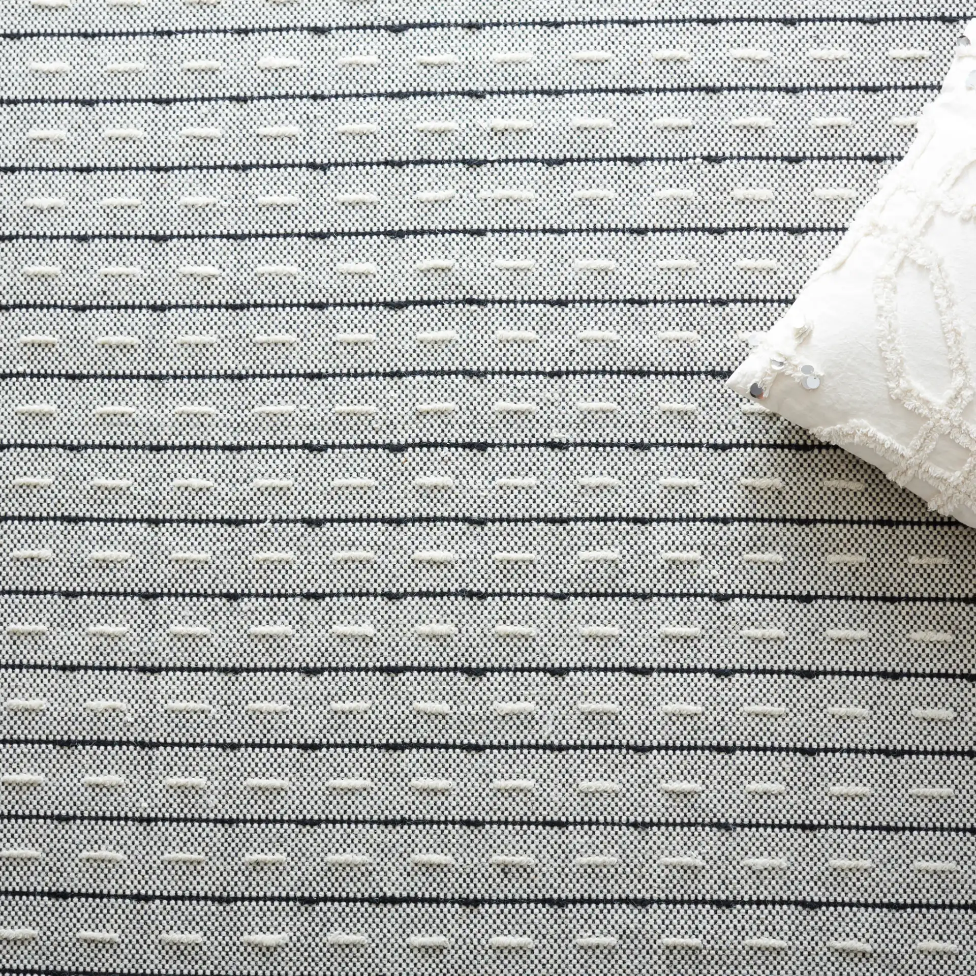 Vermont Dashed Stripe Flatweave Rug in Ivory / Black in a styled room