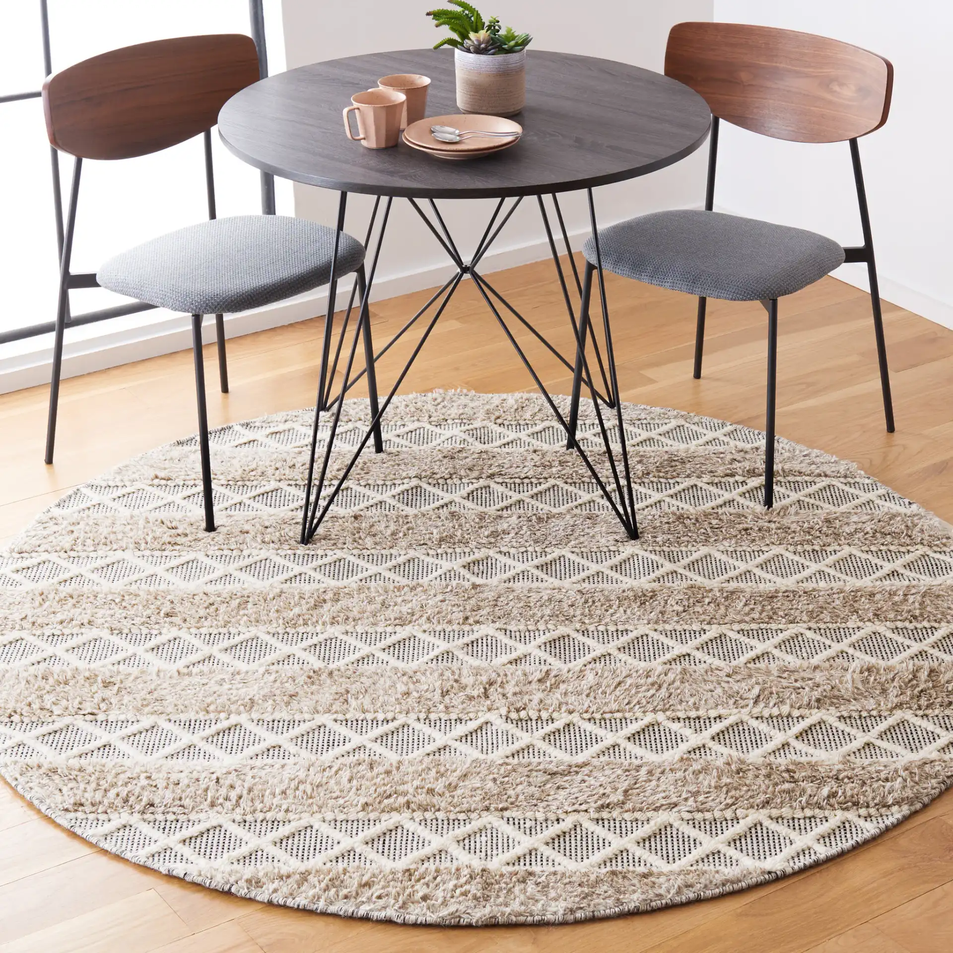 Vermont Banded Diamond Flatweave Wool Rug in Beige / Ivory in a styled room