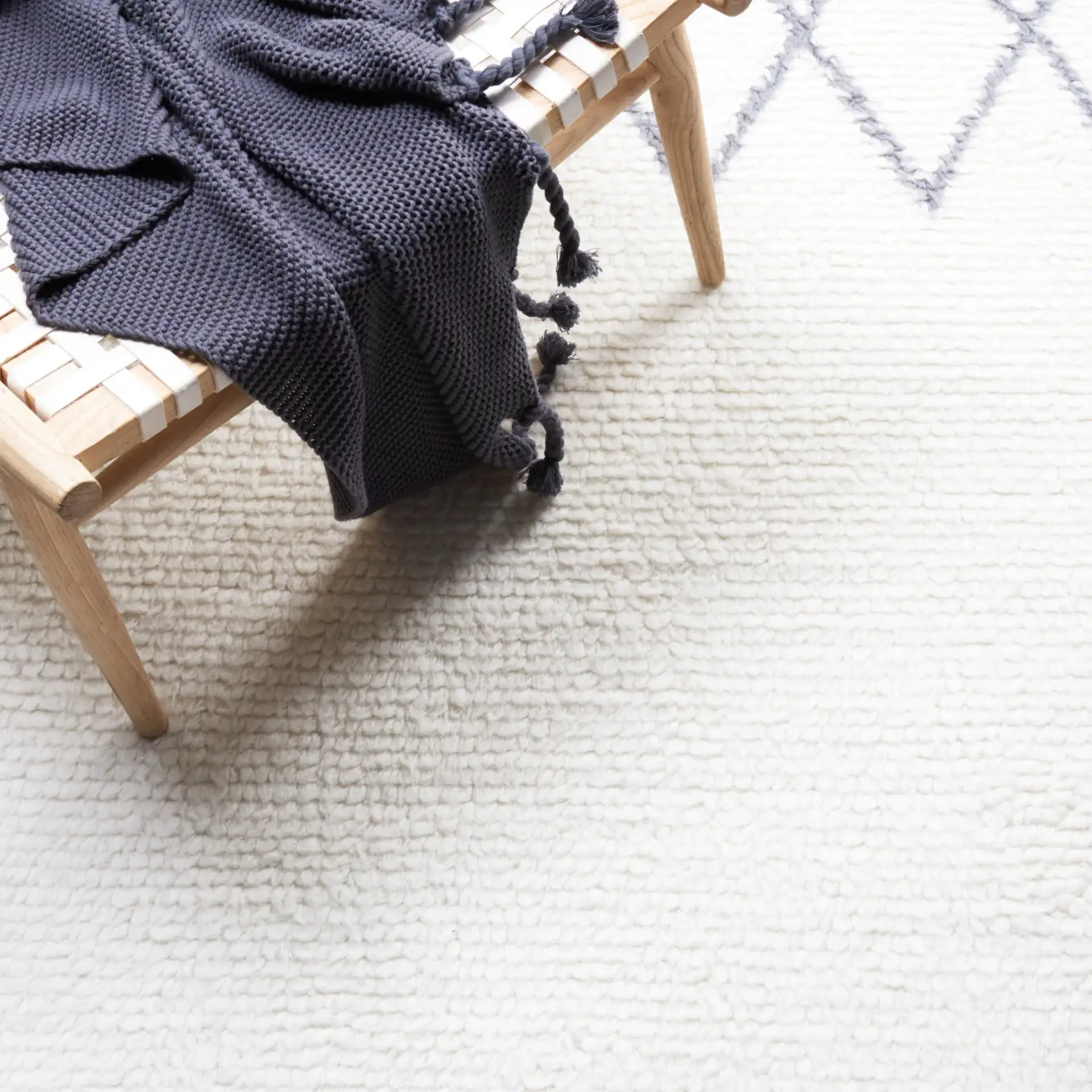 Vermont Moroccan Diamond Trellis Hand-Tufted Wool Rug in Ivory / Gray in a styled room