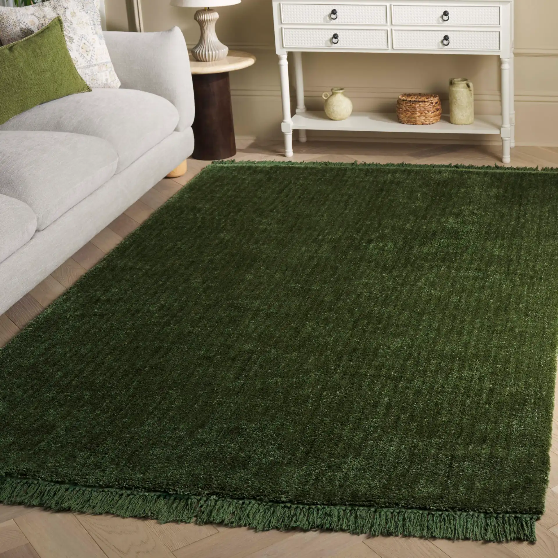 Vermont Ribbed Fringe Rug in Green in a styled room