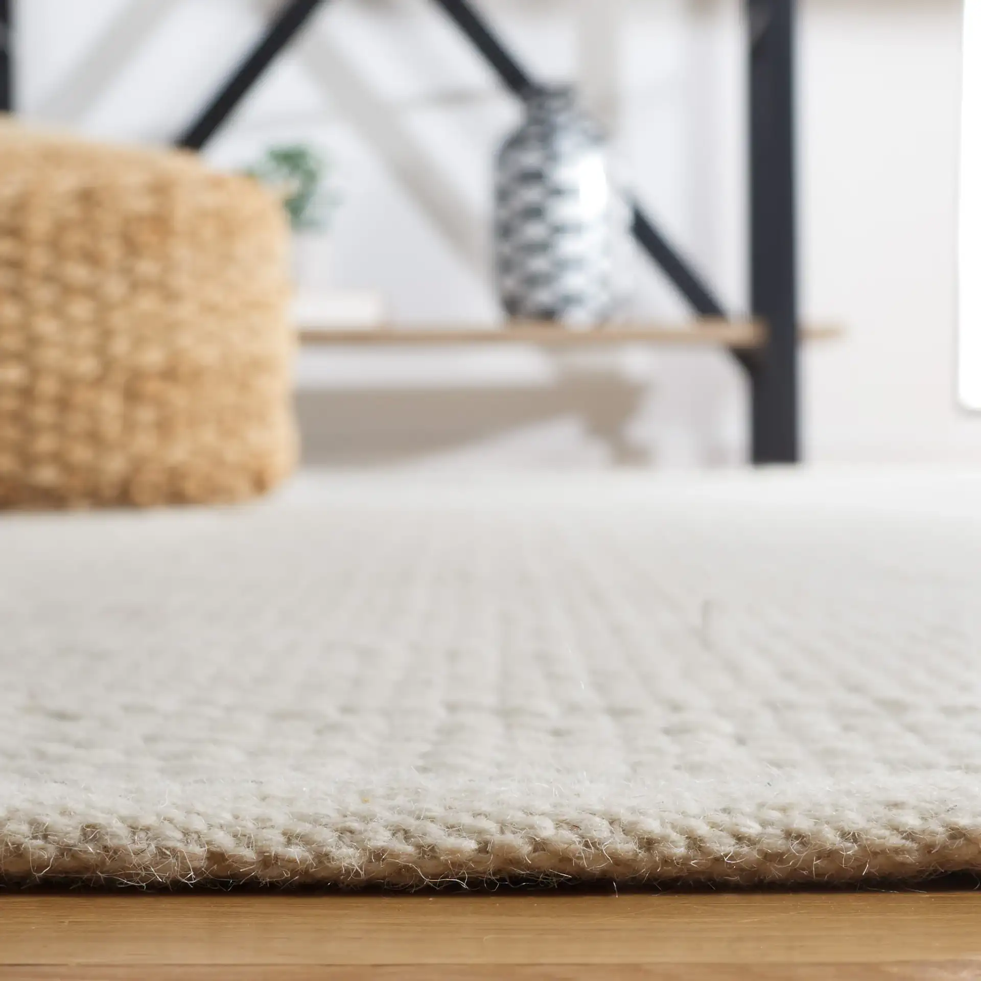 Vermont Textured Flatweave Wool Rug in Green in a styled room