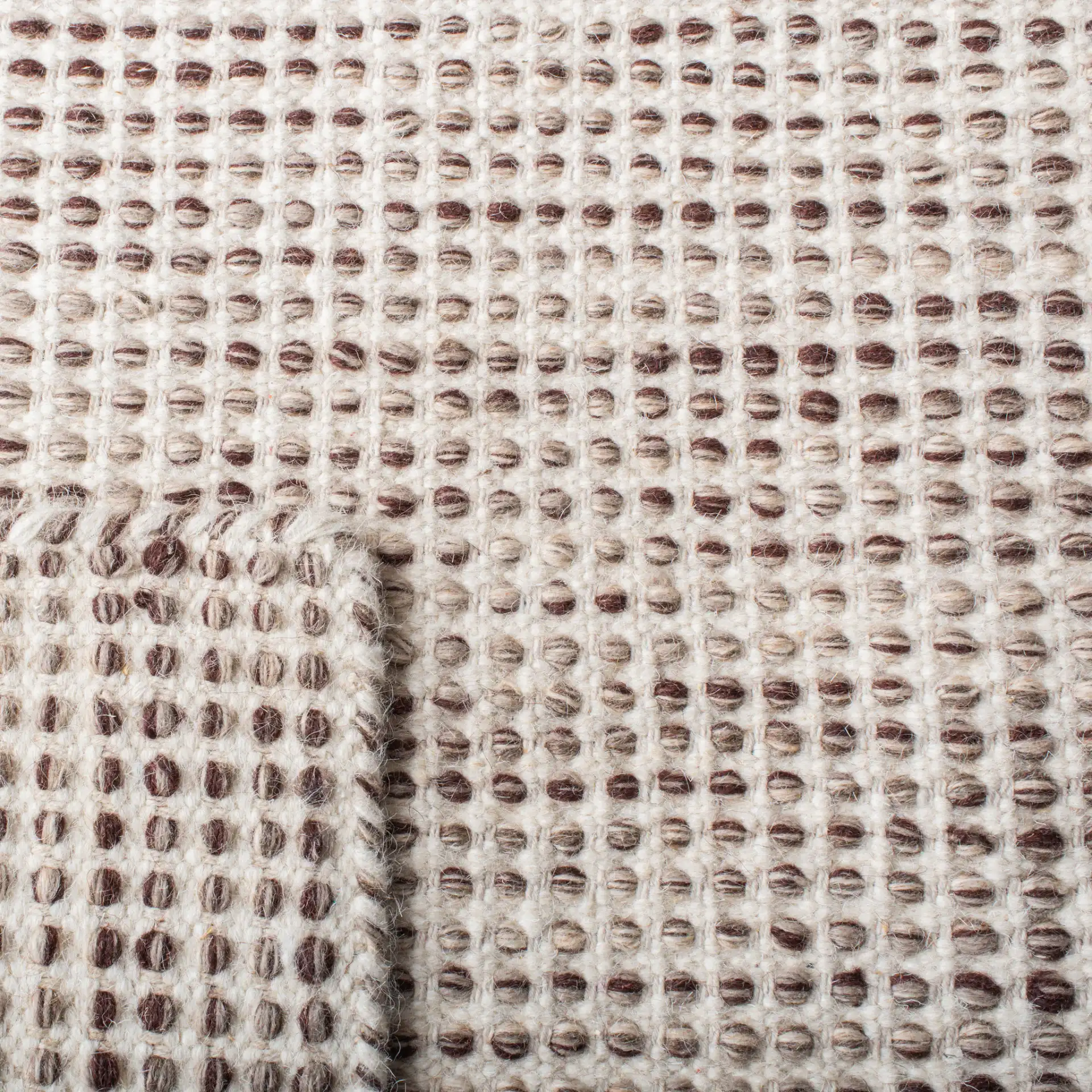Vermont Textured Grid Hand-Tufted Wool Rug in Brown / Ivory in a styled room