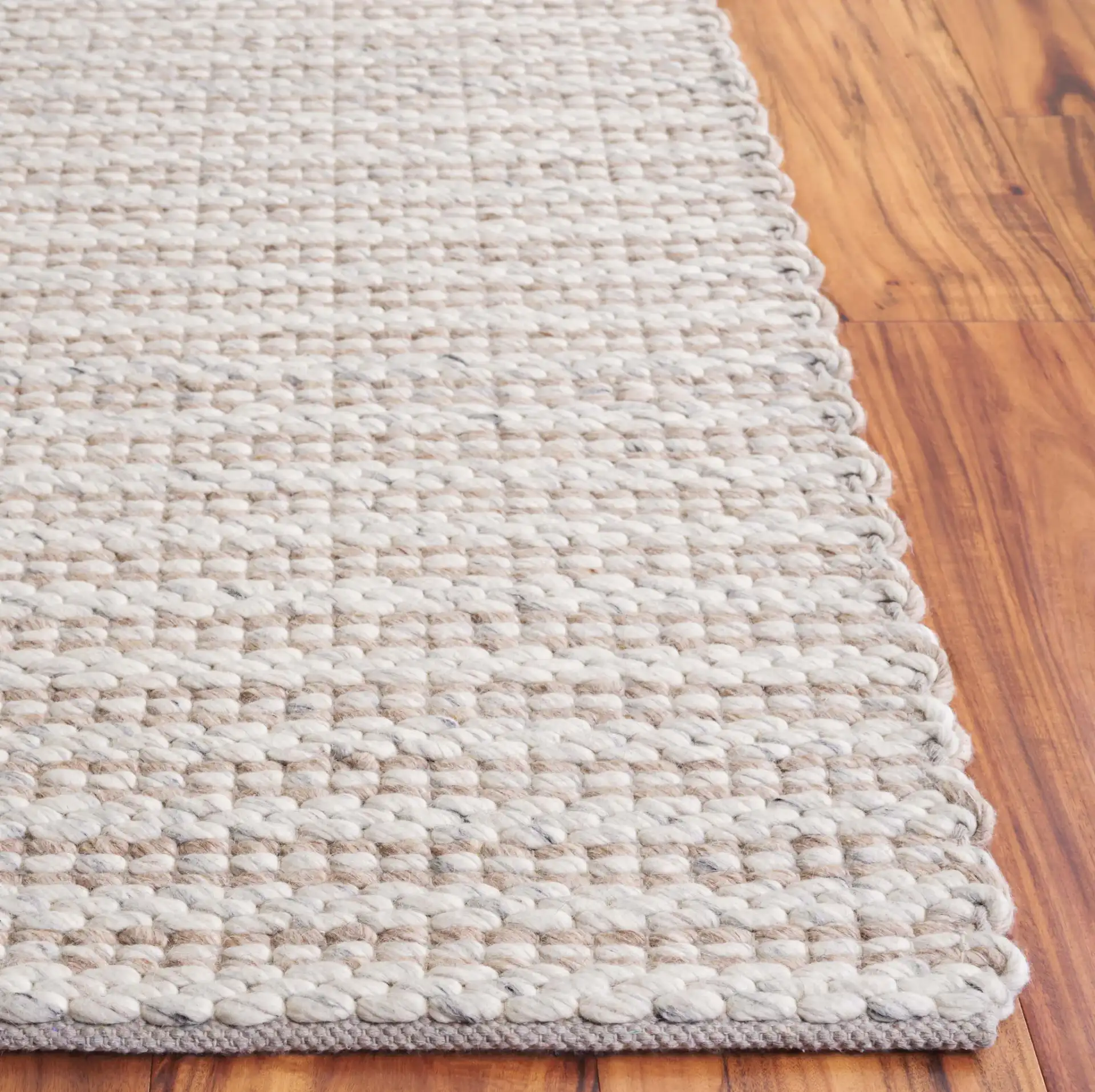 Vermont Striped Hand-Woven Rug in Brown / Silver in a styled room