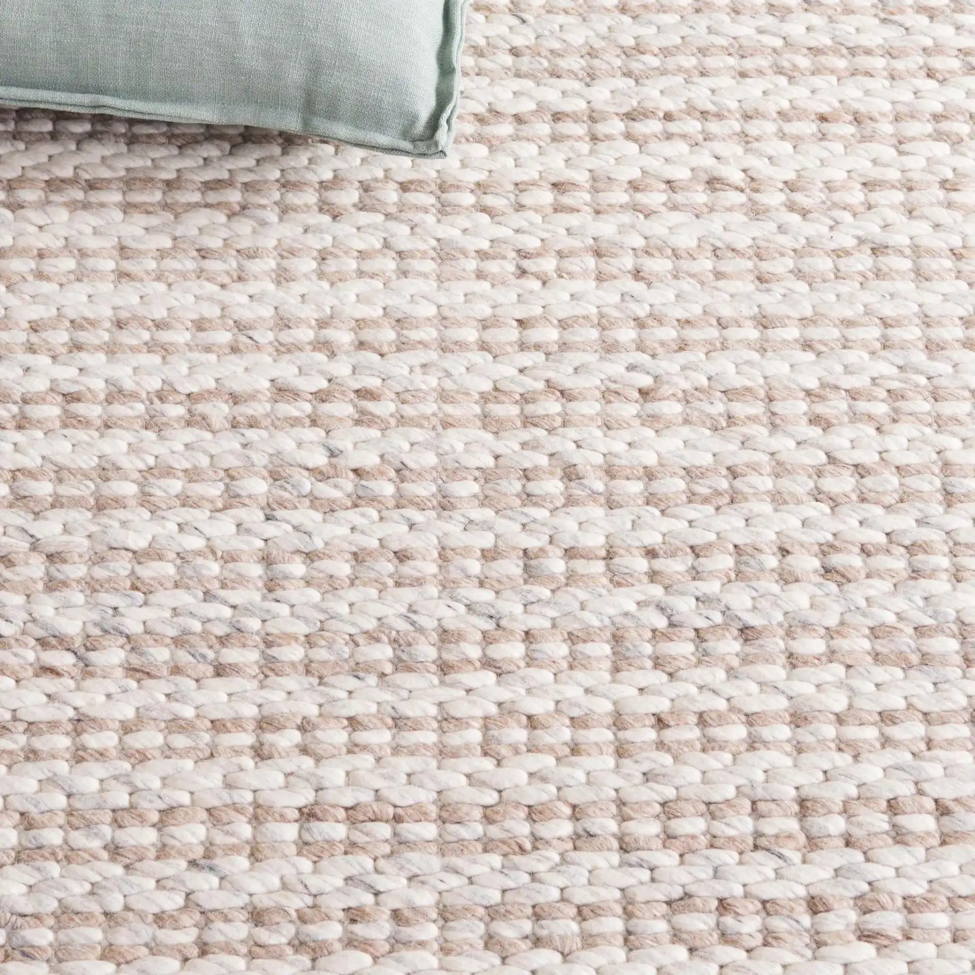 Vermont Striped Hand-Woven Rug in Brown / Silver in a styled room