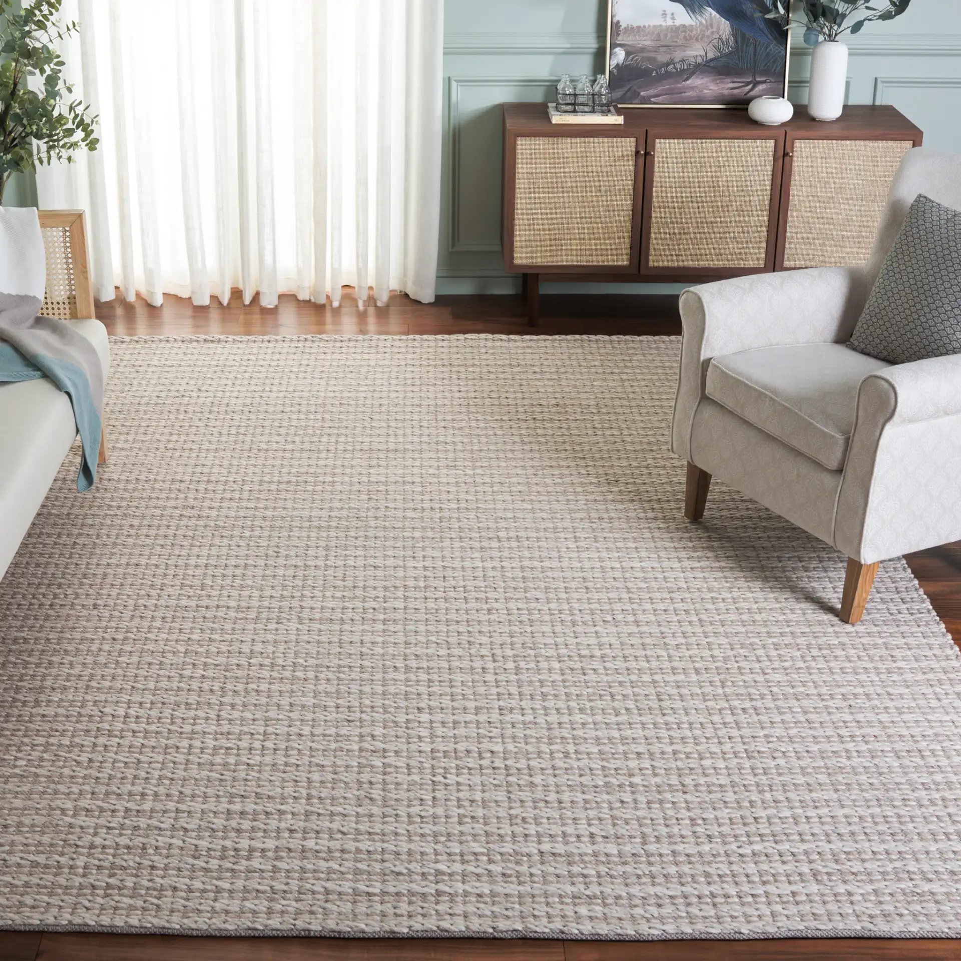 Vermont Striped Hand-Woven Rug in Brown / Silver in a styled room