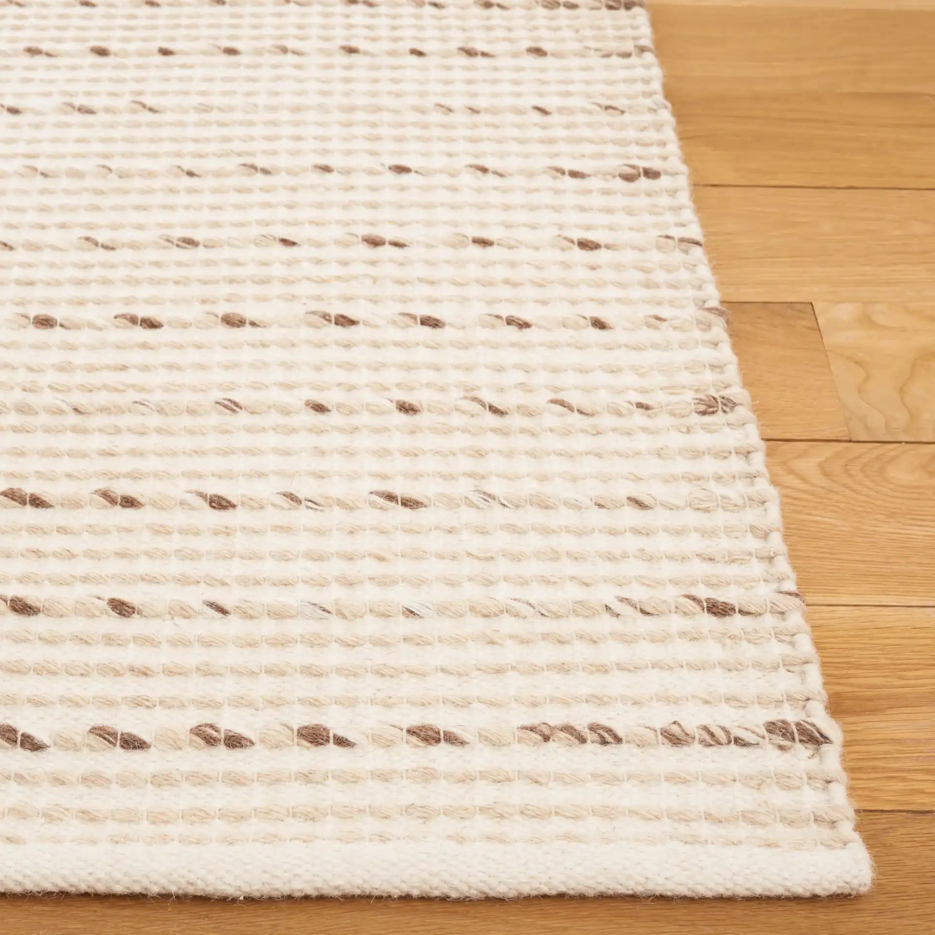 Vermont Dashed Stripe Flatweave Wool Rug in Ivory / Beige in a styled room