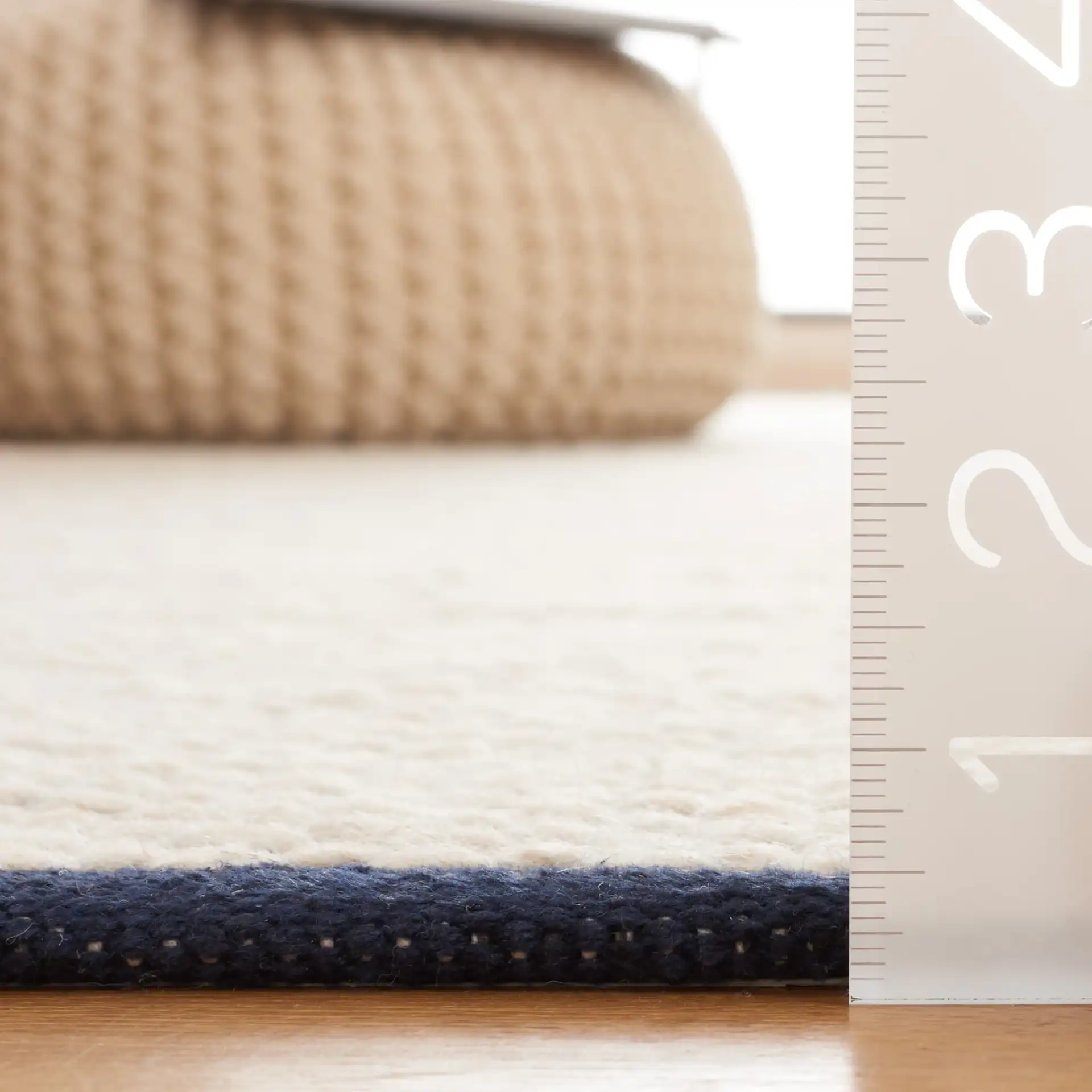 Vermont Heathered Flatweave Wool Rug in Navy / Ivory in a styled room