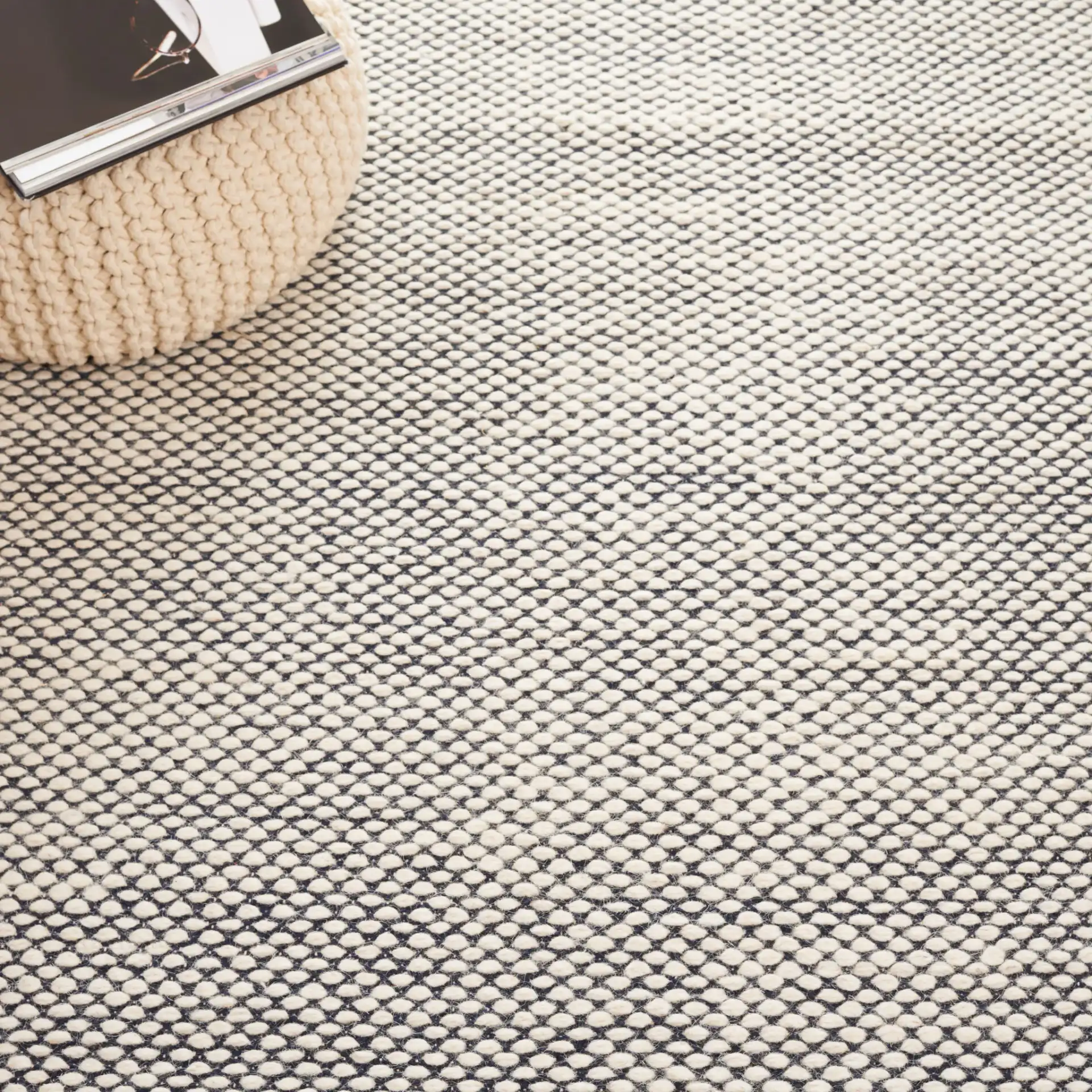 Vermont Heathered Flatweave Wool Rug in Navy / Ivory in a styled room