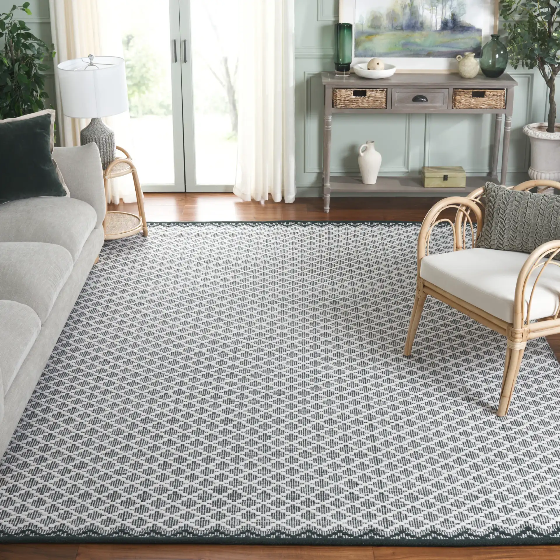 Vermont Micro Diamond Hand-Woven Wool Rug in Green / Ivory in a styled room