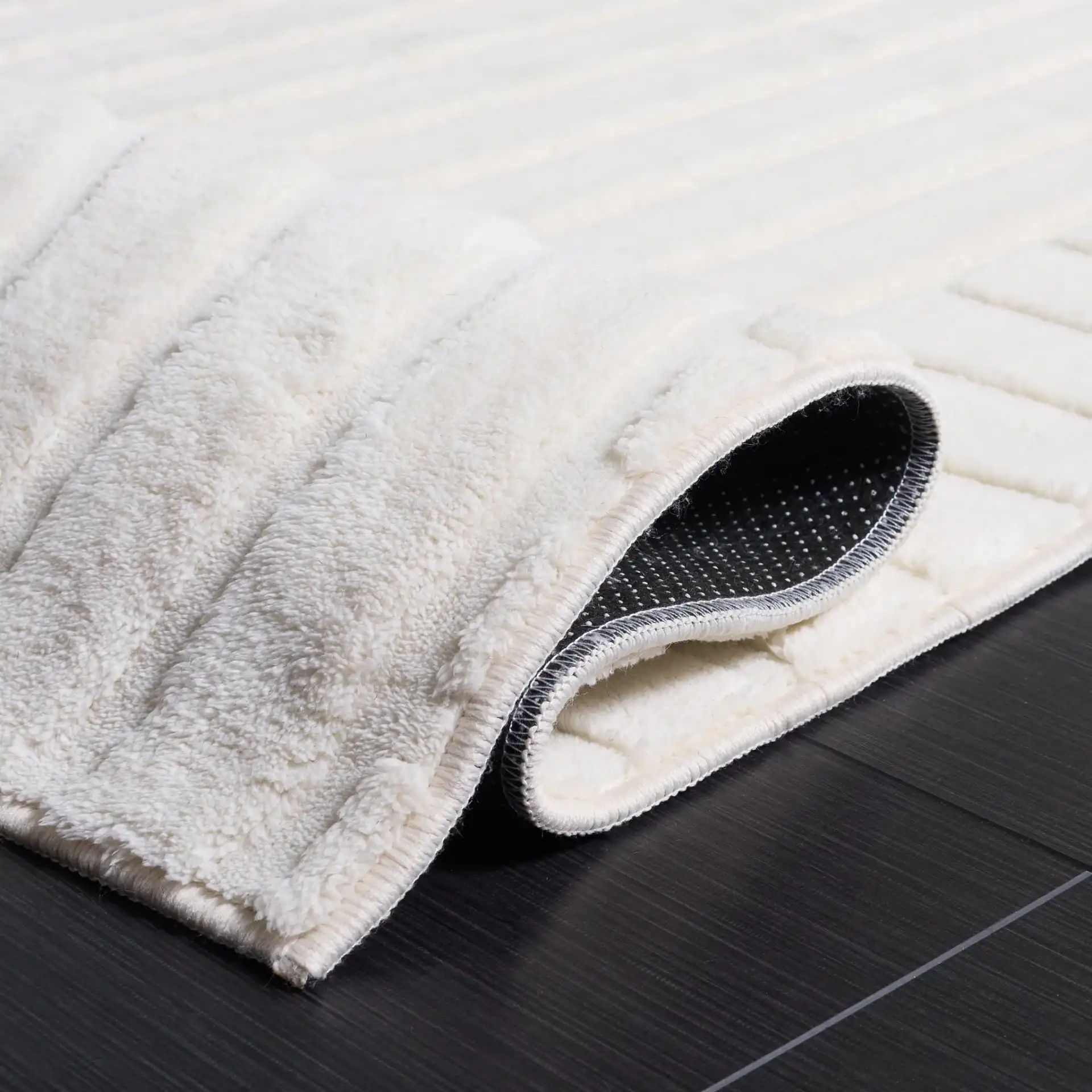 Versailles Concentric Arches Washable Rug in Ivory in a styled room