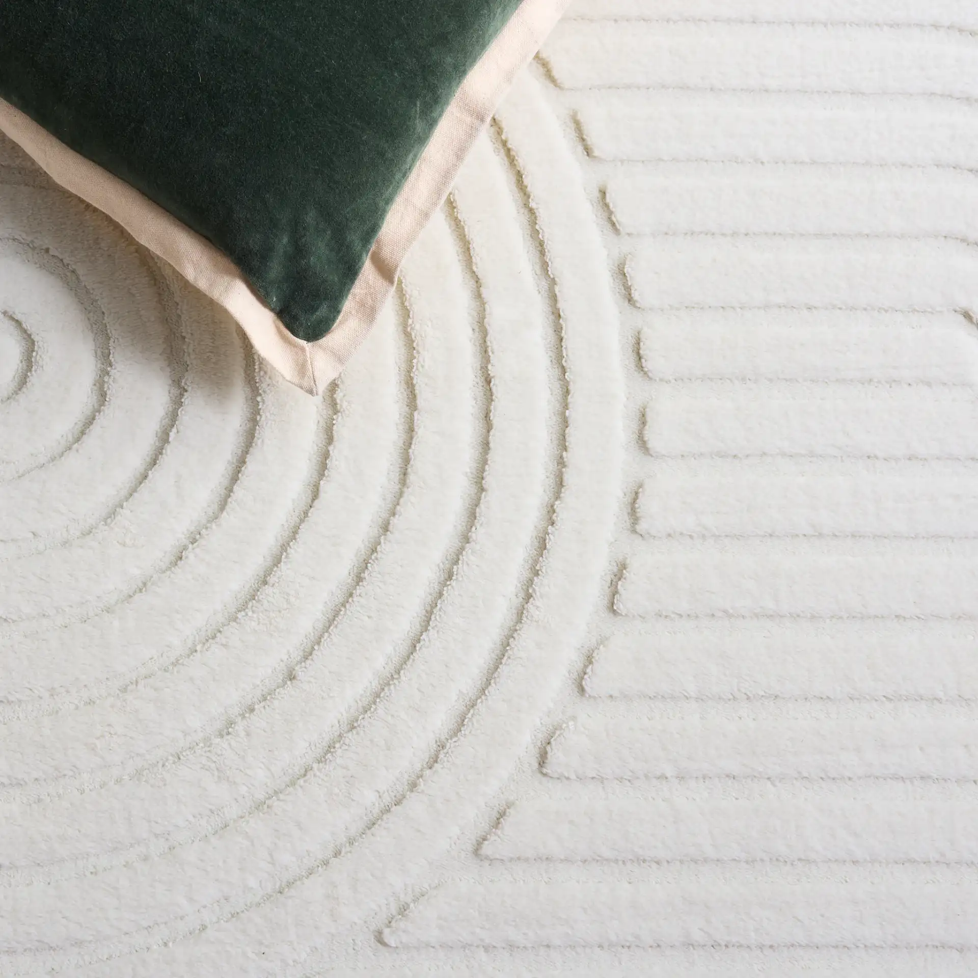 Versailles Nested Arches Washable Rug in Ivory in a styled room