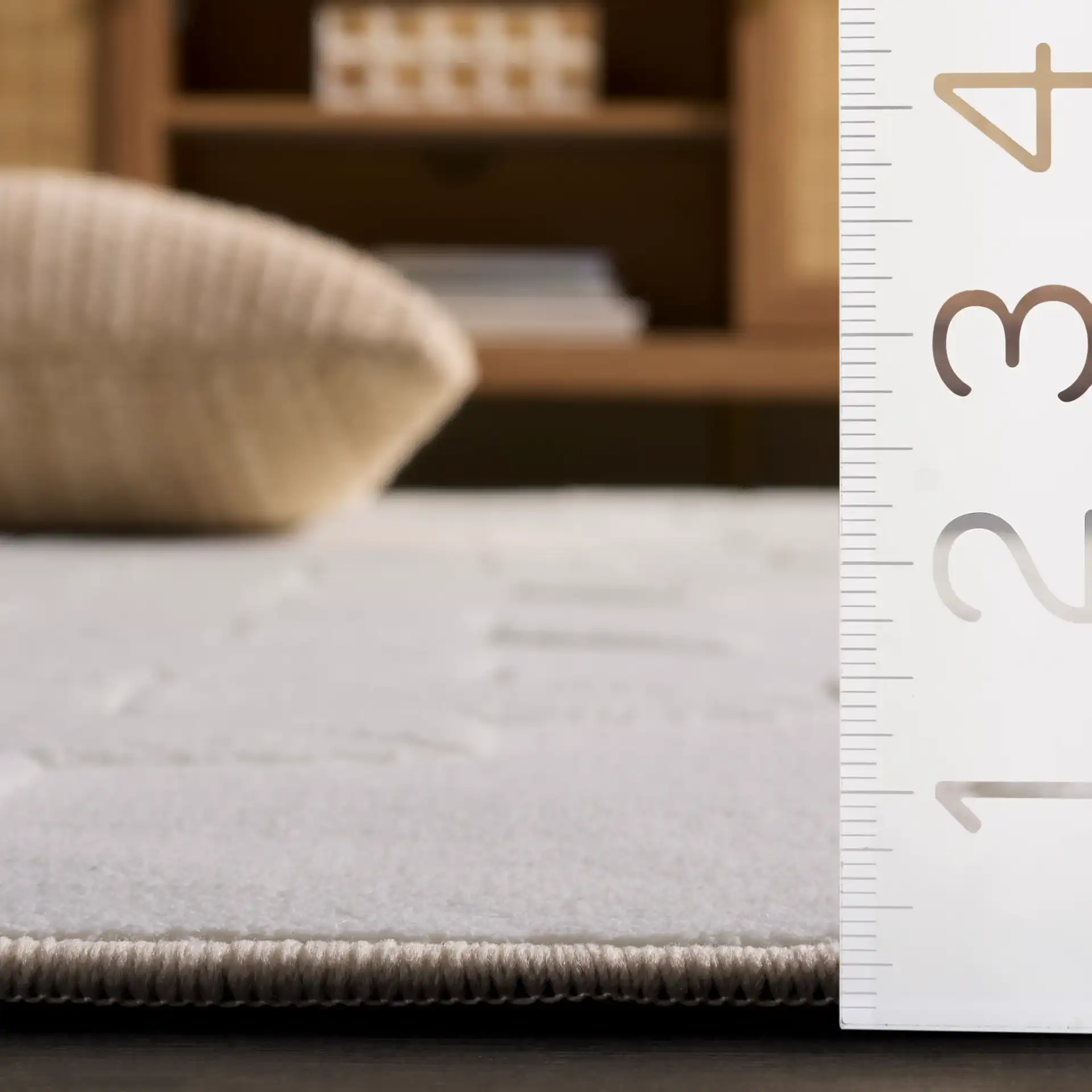 Versailles Cube Washable Rug in Ivory in a styled room