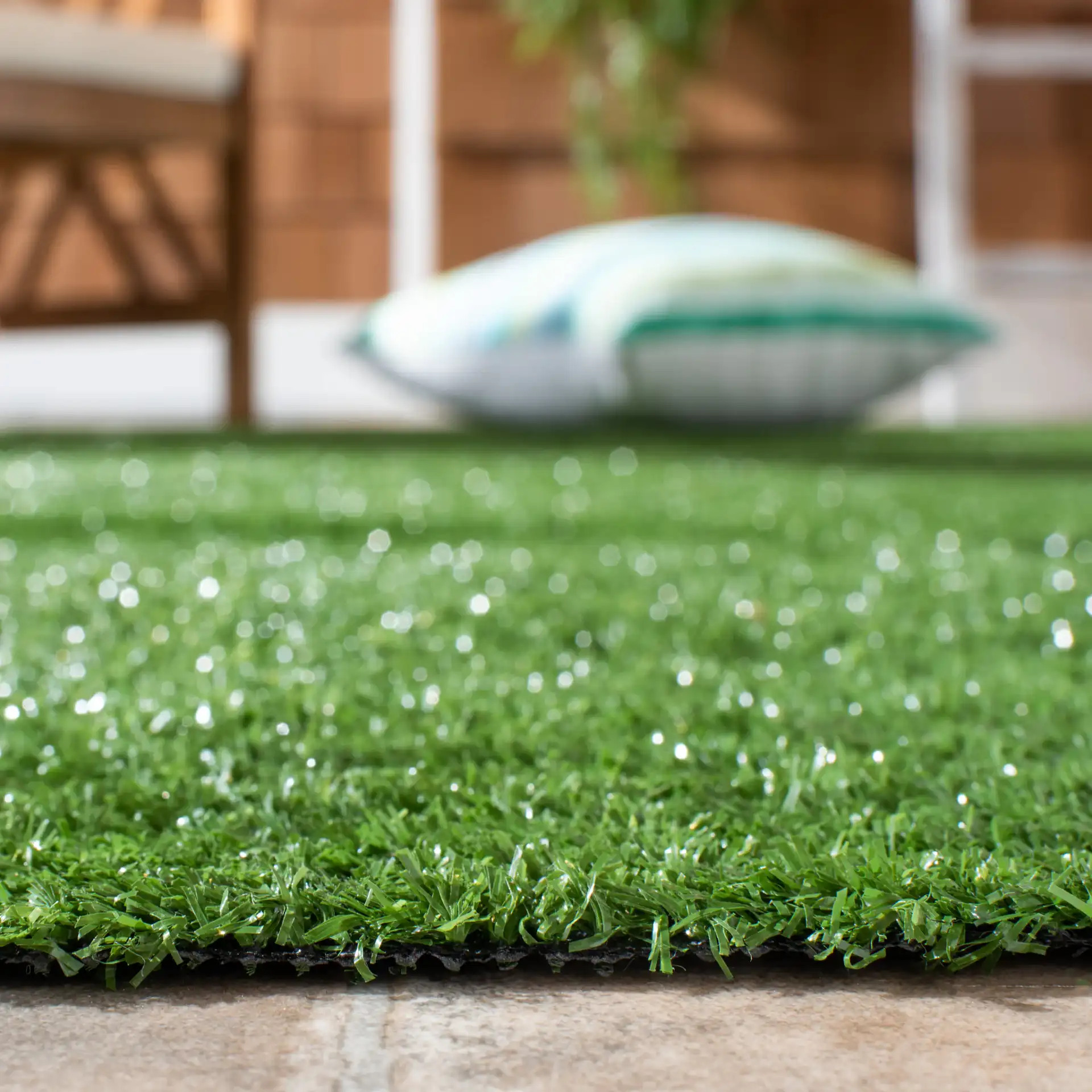 Turf Solid Runner Outdoor Rug in Green in a styled room