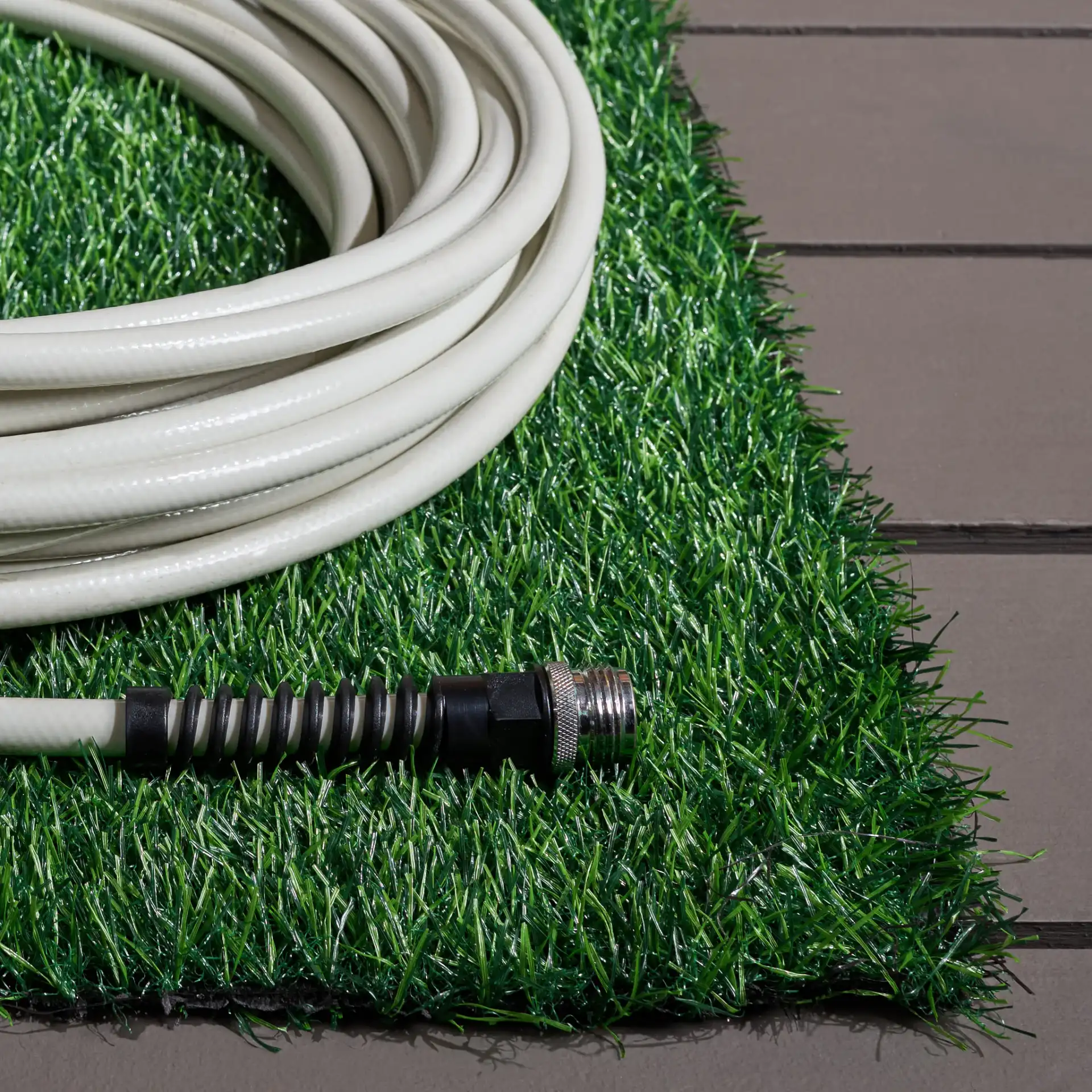 Turf Modern Solid Outdoor Rug in Green / Light Green in a styled room