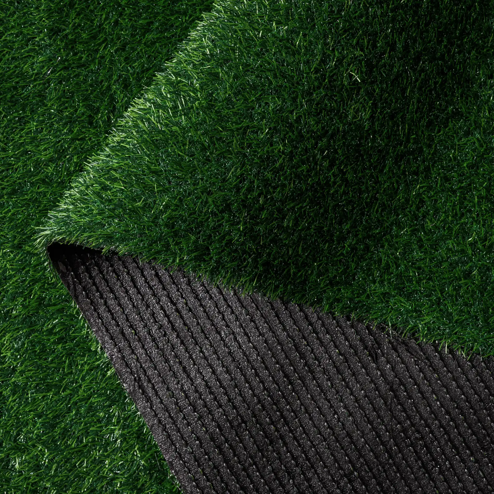 Turf Modern Solid Outdoor Rug in Green / Light Green in a styled room