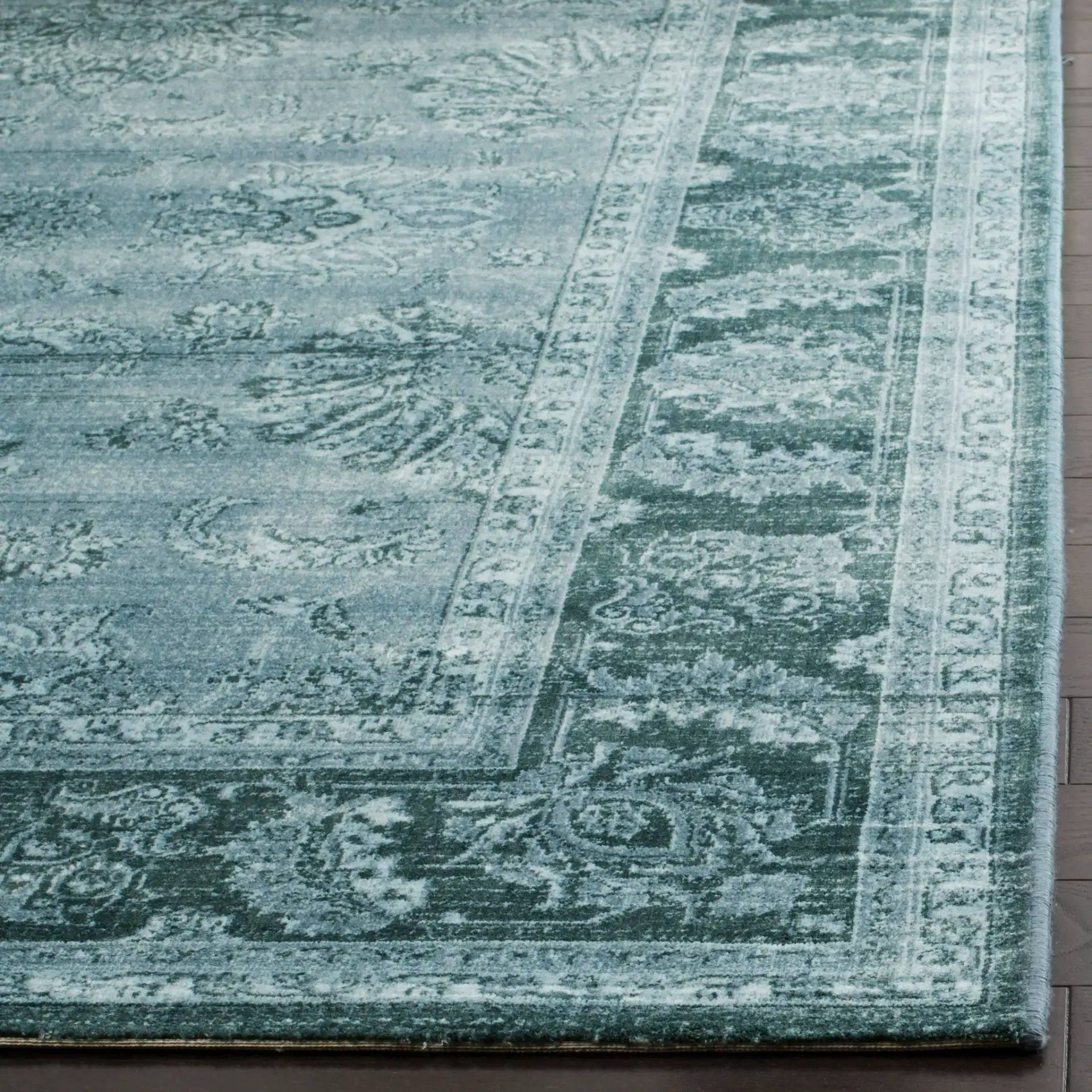 Vintage Floral Bordered Viscose Rug in Light Blue / Dark Blue in a styled room
