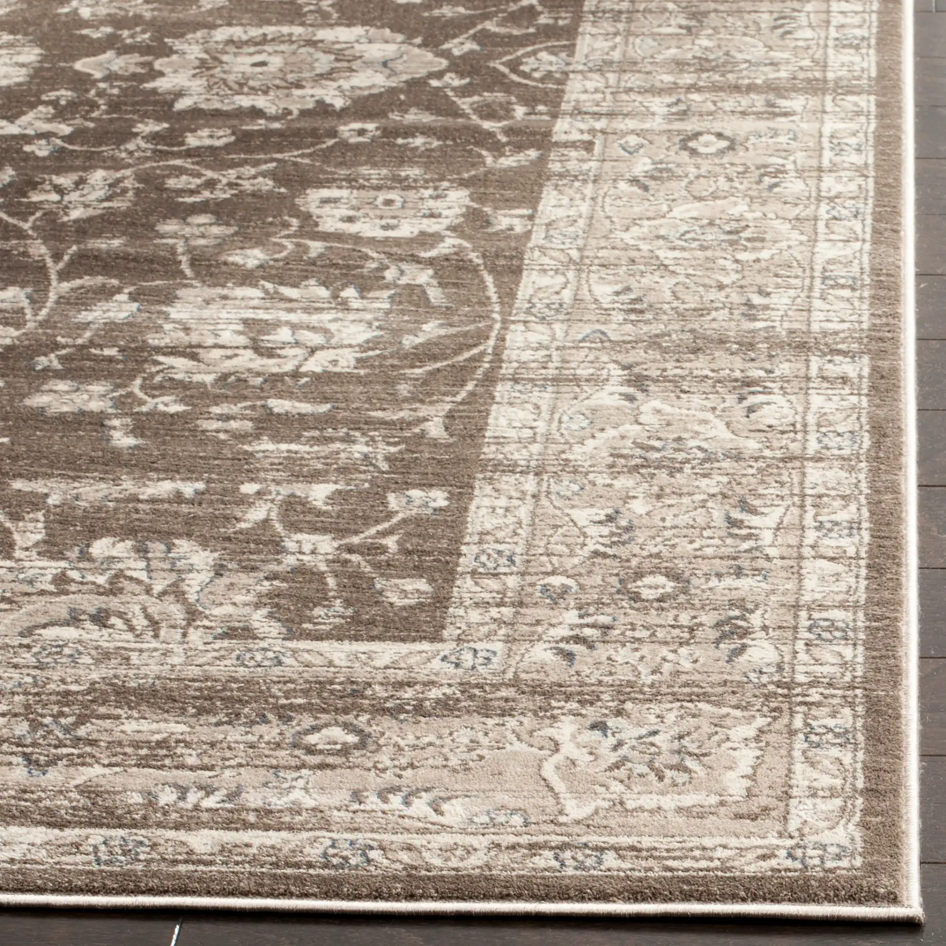 Vintage Distressed Floral Vine Rug in Brown / Ivory in a styled room