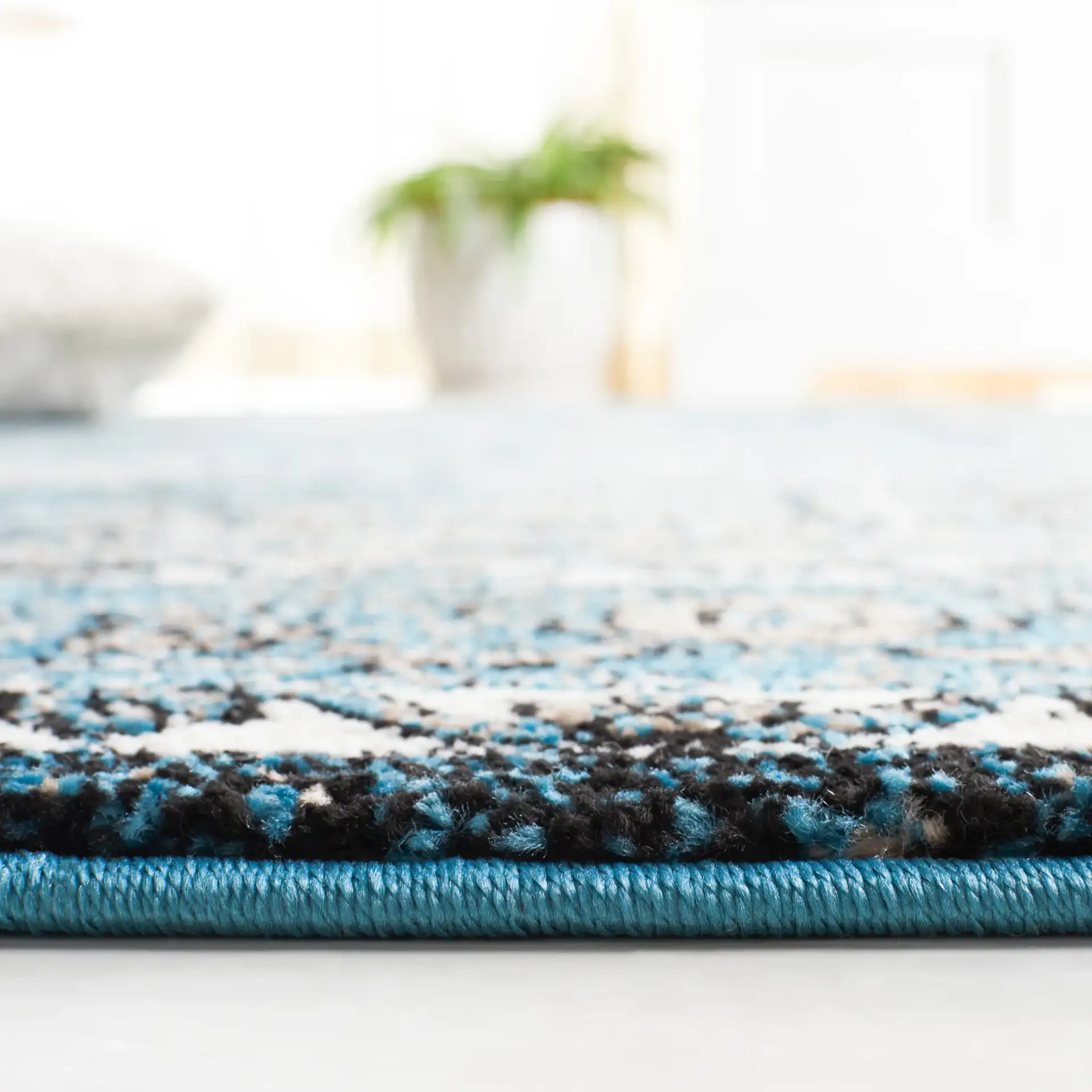 Vintage Hamadan Framed Medallion Rug in Blue / Ivory in a styled room