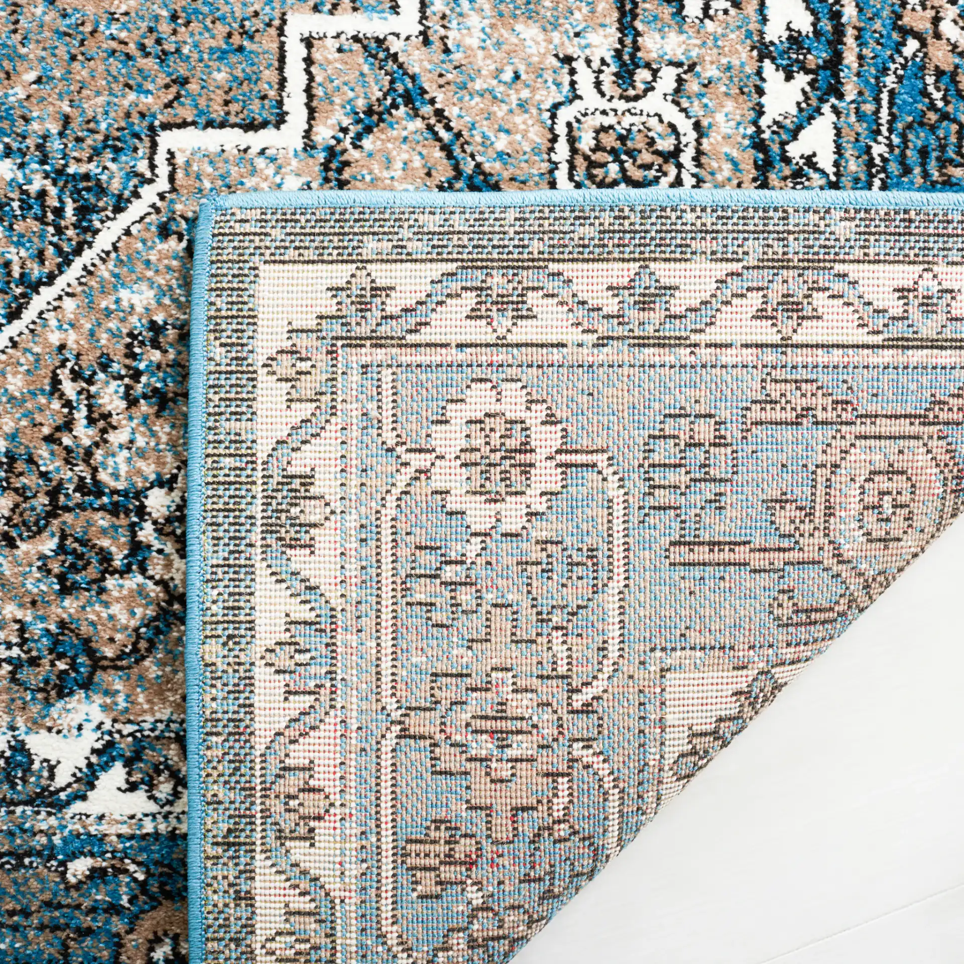 Vintage Hamadan Framed Medallion Rug in Blue / Ivory in a styled room