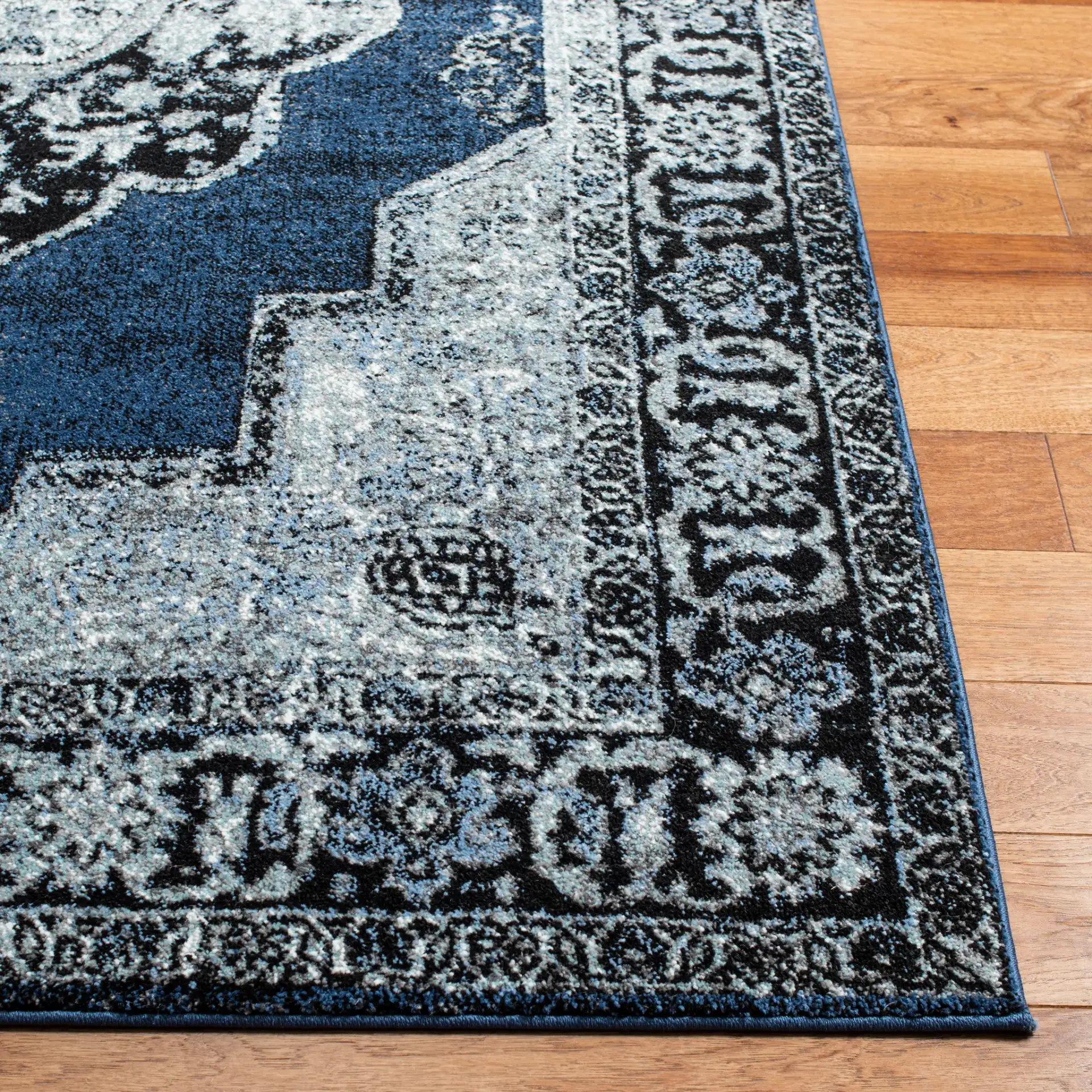 Vintage Hamadan Floral Medallion Rug in Blue / Gray in a styled room