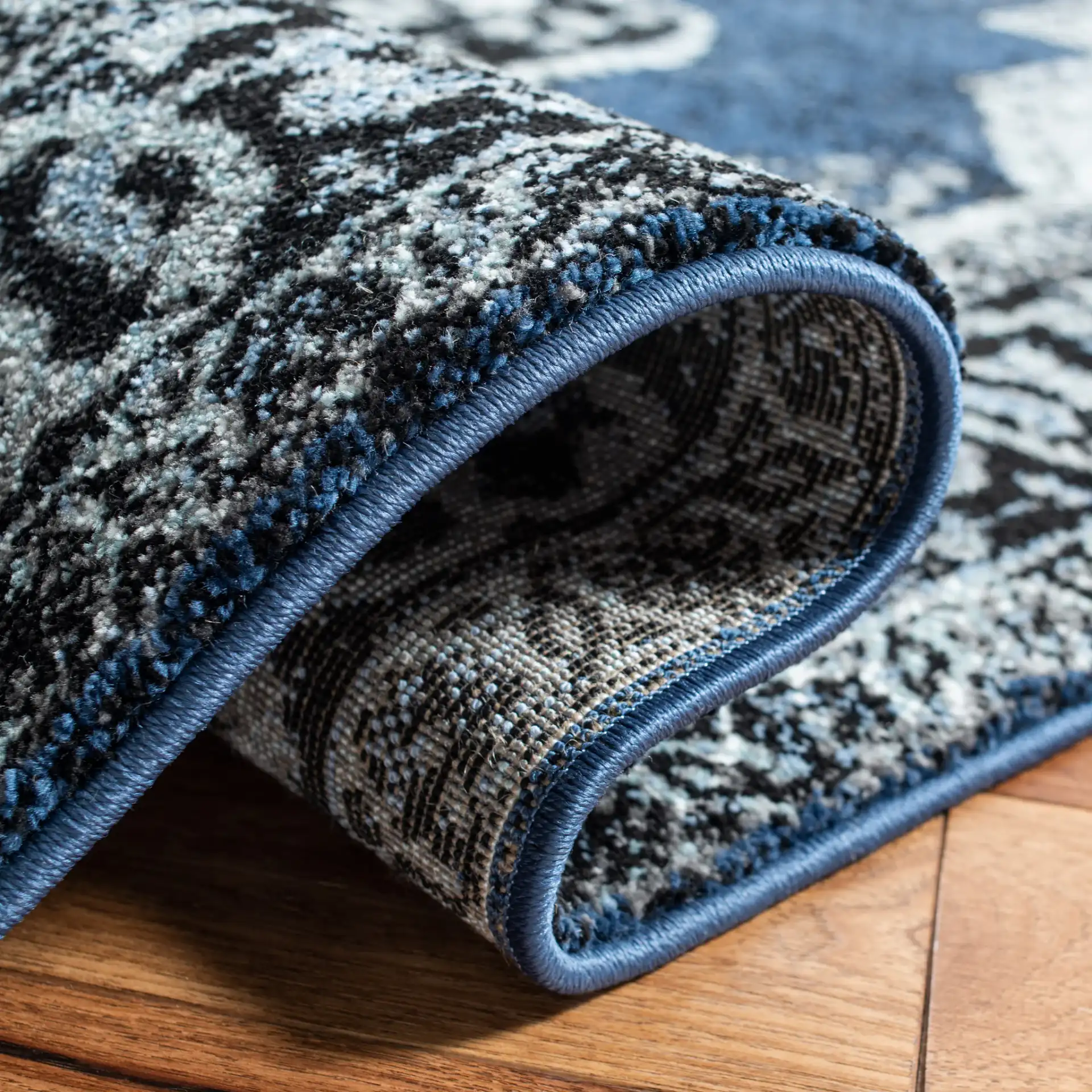 Vintage Hamadan Floral Medallion Rug in Blue / Gray in a styled room