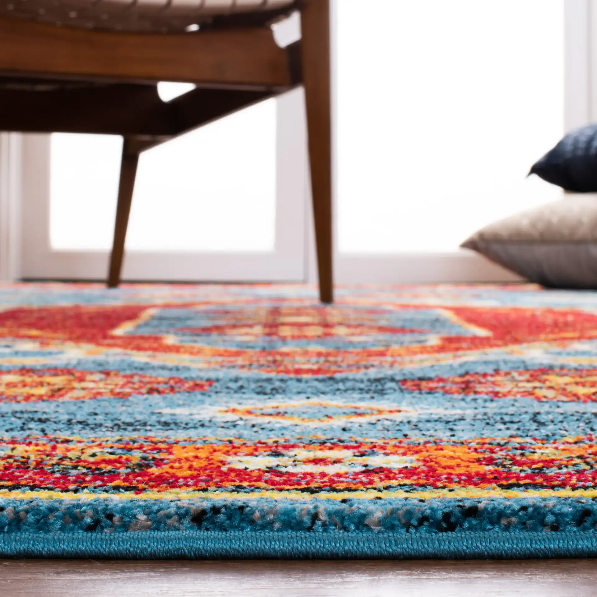 Vintage Hamadan Southwestern Medallion Rug in Blue / Orange in a styled room