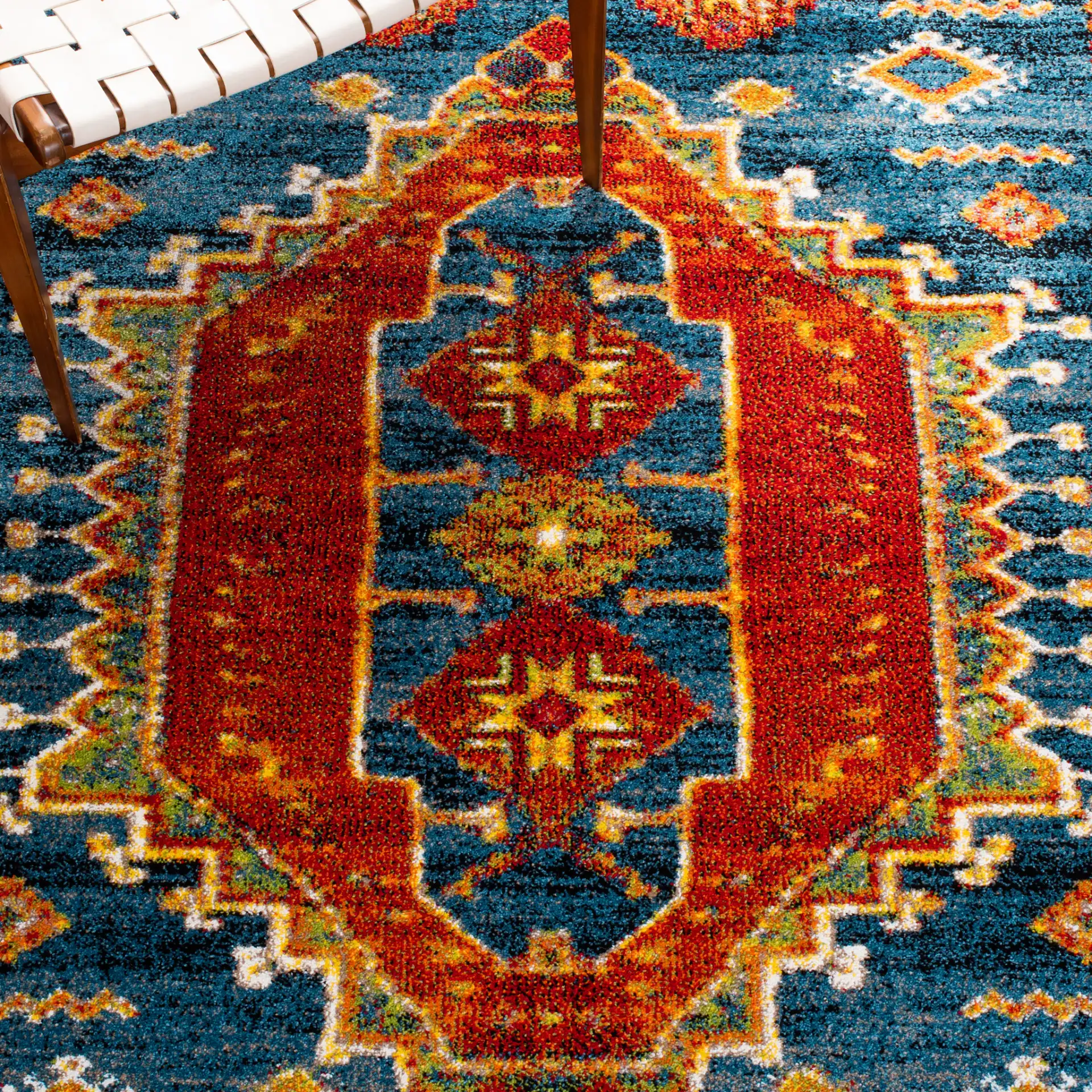 Vintage Hamadan Southwestern Medallion Rug in Blue / Orange in a styled room