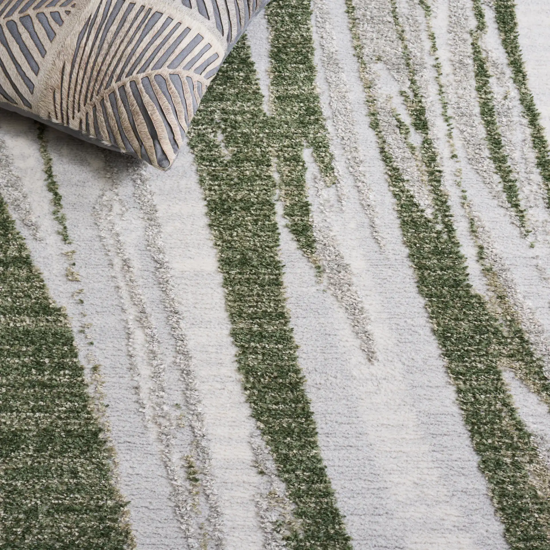 Wave Abstract Stripe Rug in Green / Ivory in a styled room