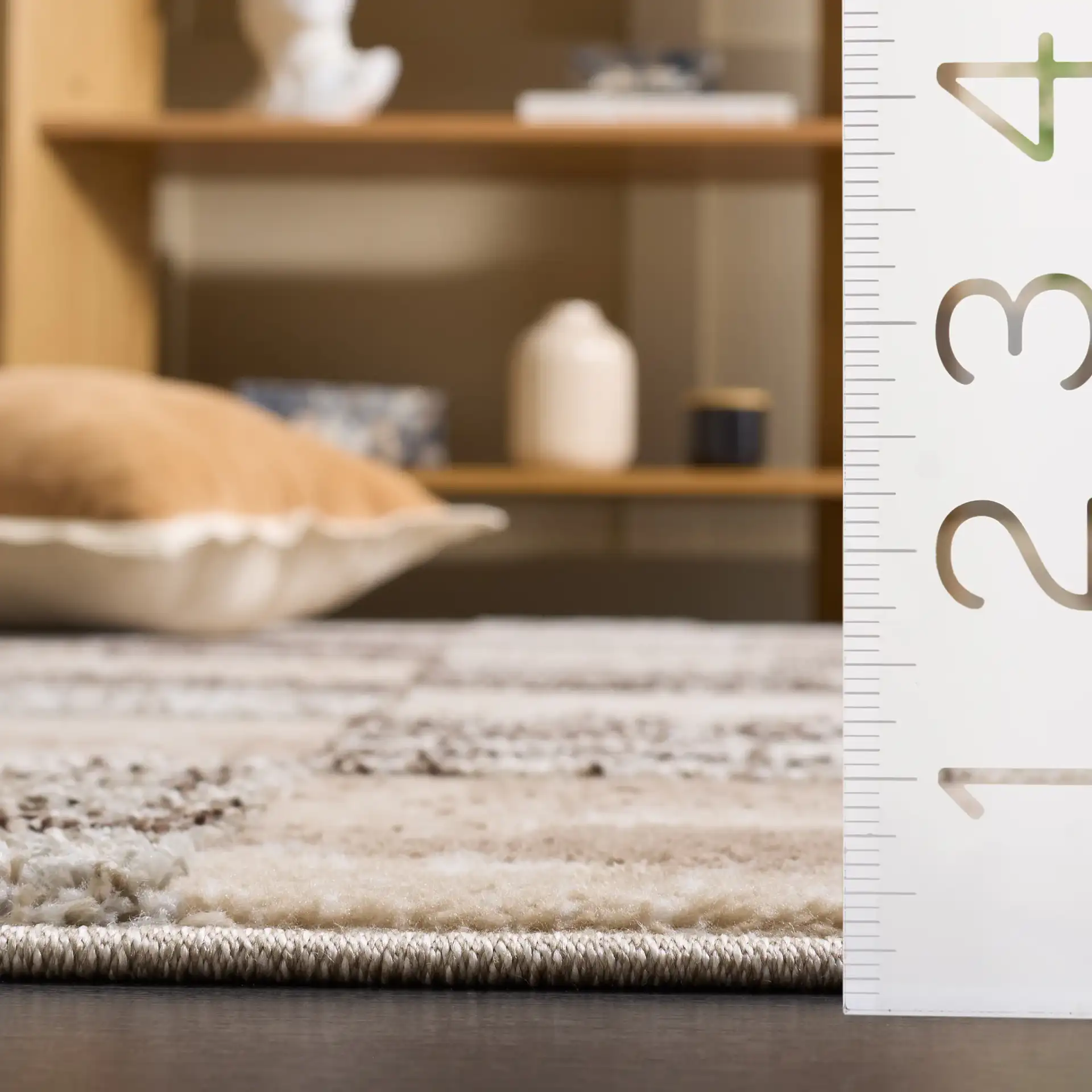 Wave Checkered Rug in Beige / Gray in a styled room