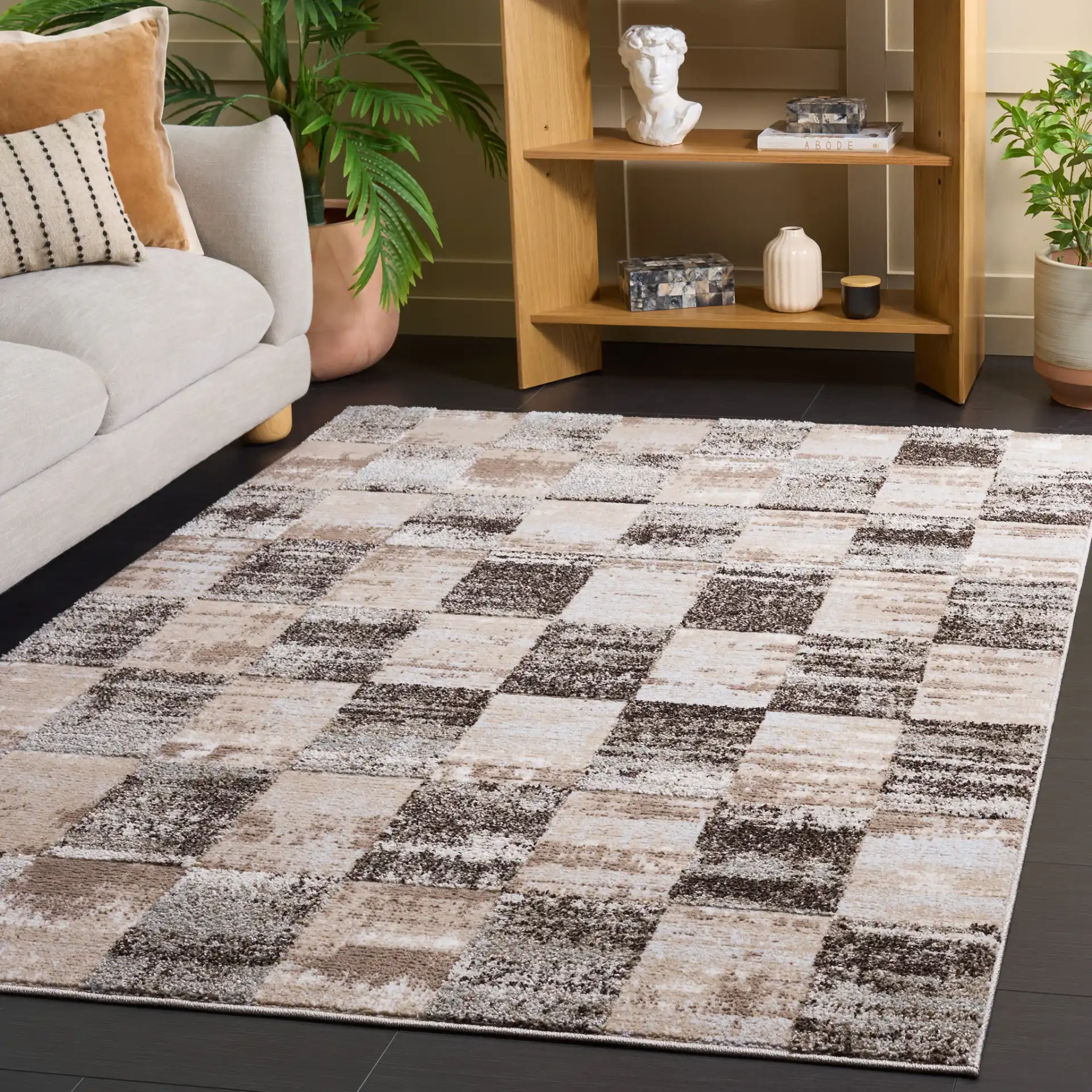 Wave Checkered Rug in Beige / Gray in a styled room