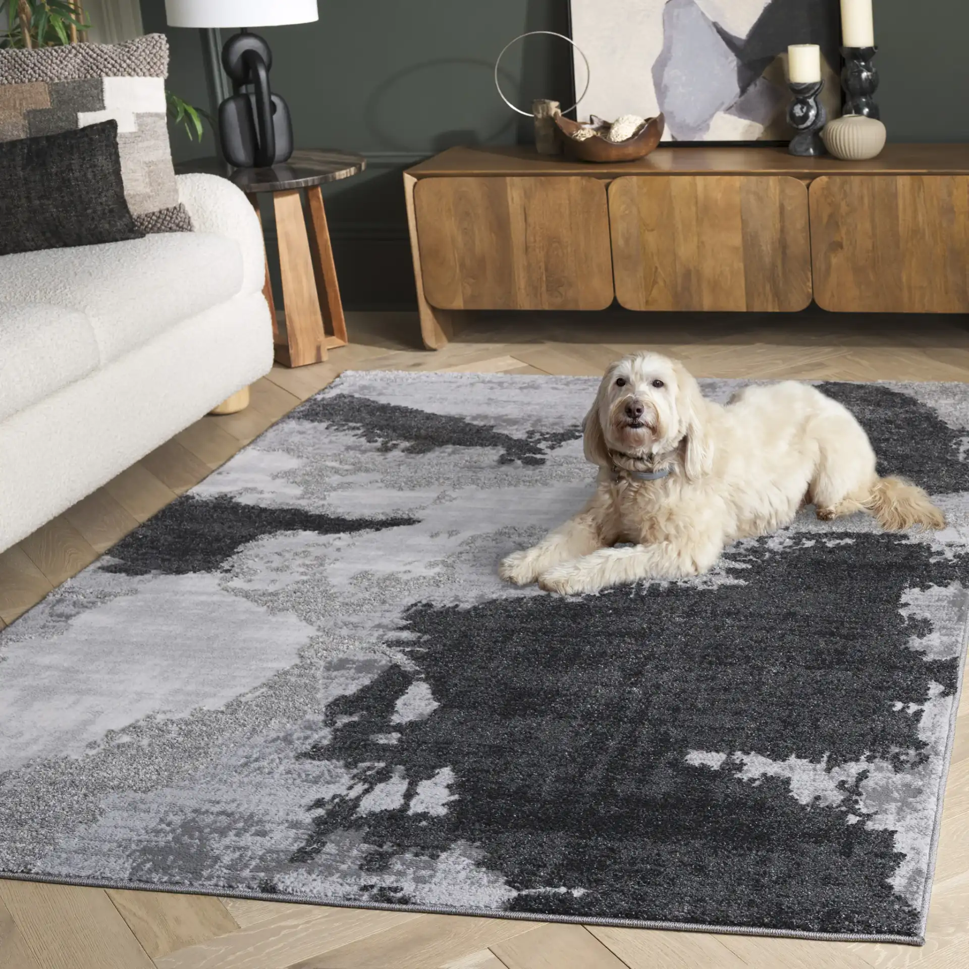 Wave Painterly Abstract Rug in Gray / Light Gray in a styled room