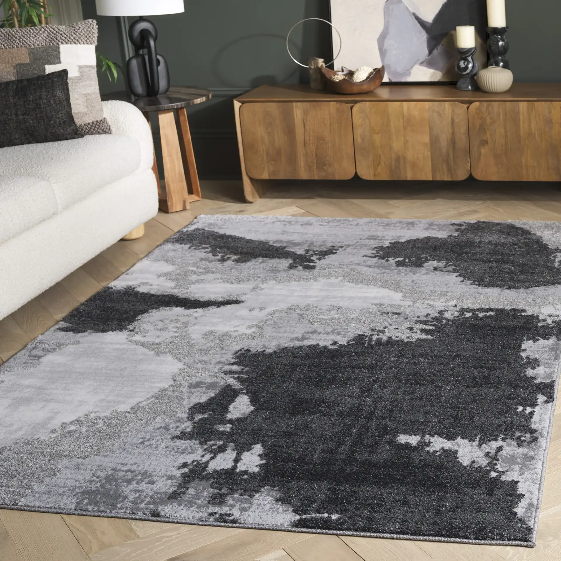 Wave Painterly Abstract Rug in Gray / Light Gray in a styled room