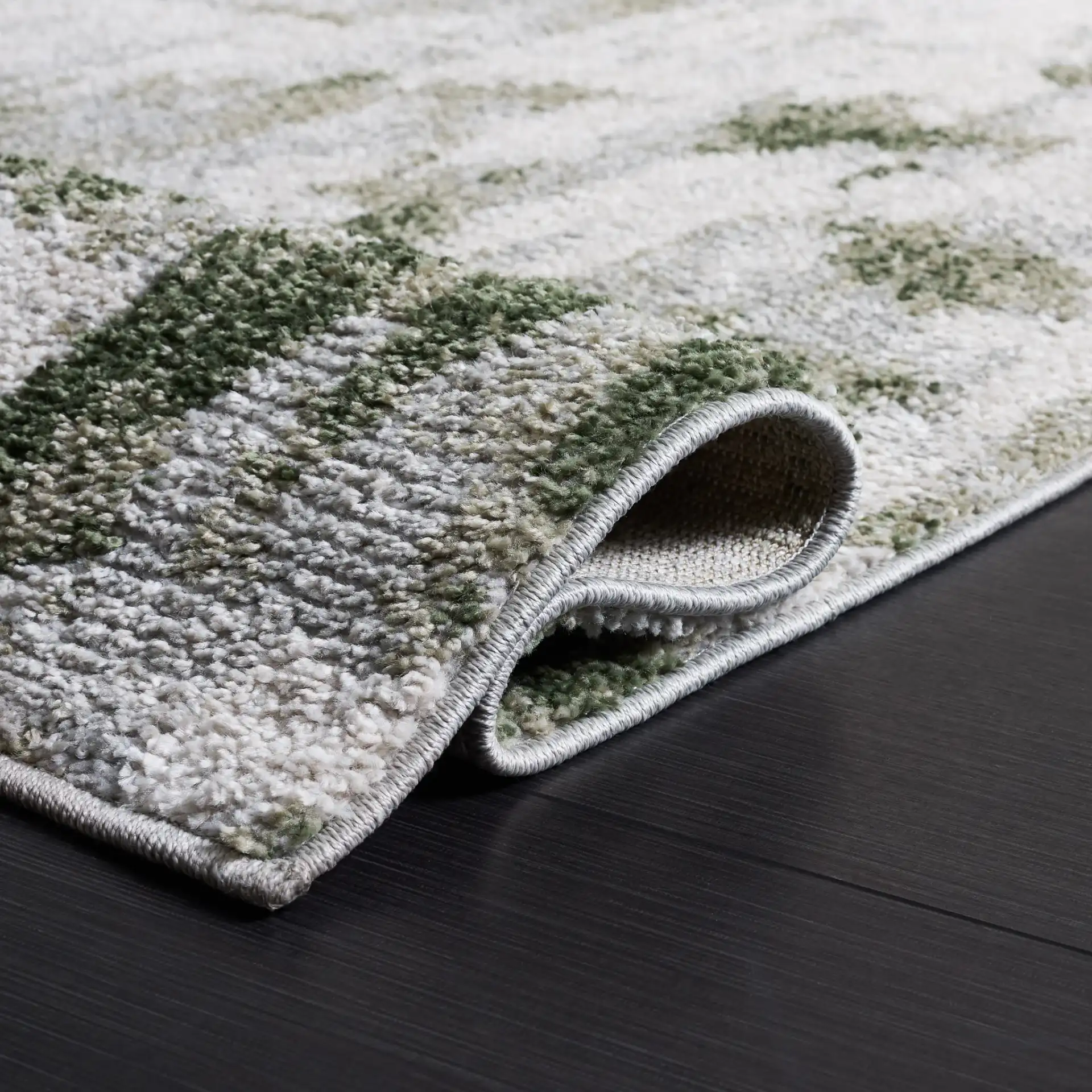 Wave Crosshatch Abstract Rug in Ivory / Green in a styled room