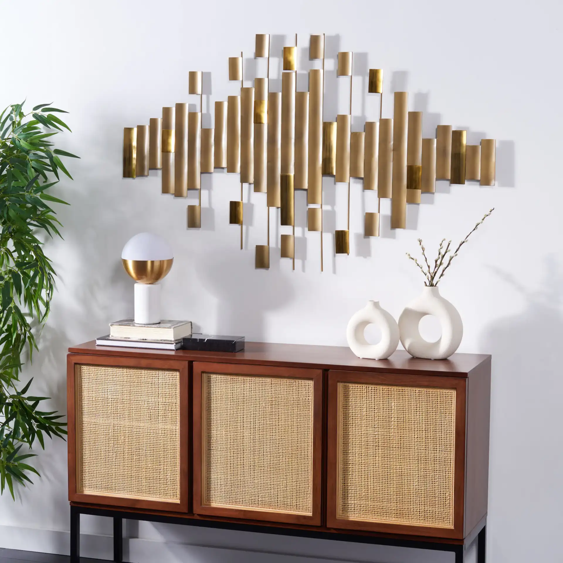Rena Wall Decor in Antique Brass in a styled room