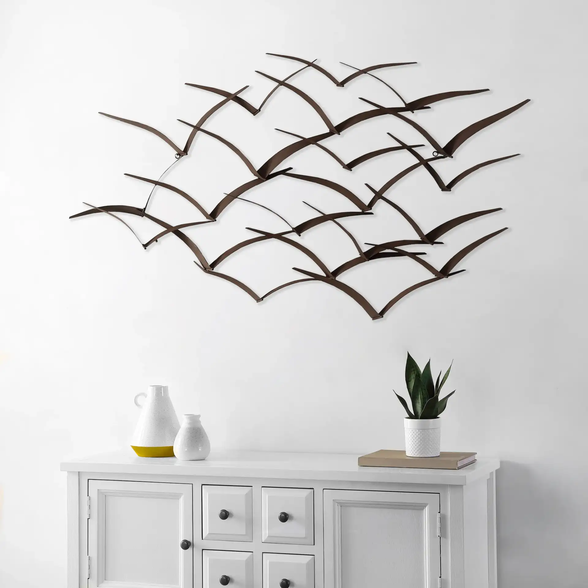 Fione 42" Wall Décor in Bronze in a styled room