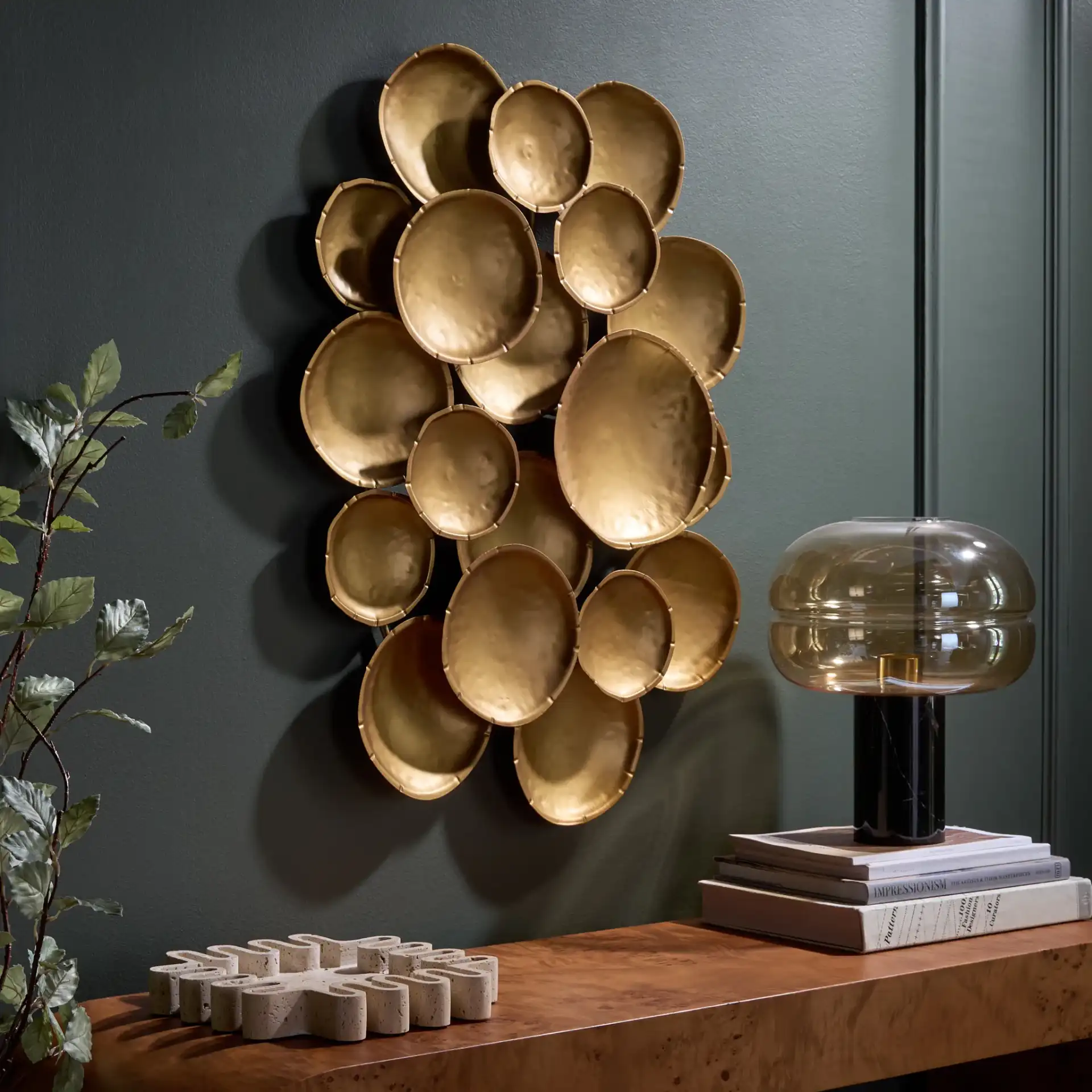 Lela Bubble Disc Wall Decor in Gold in a styled room