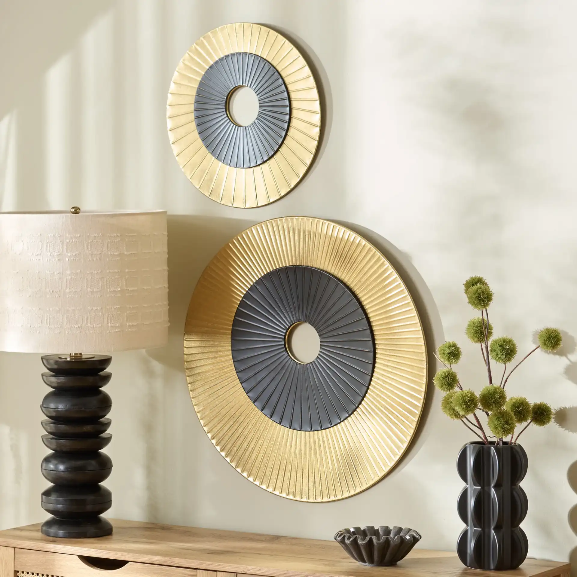 Cathy Eclipse Discs (Set Of 2) in Gold / Black in a styled room