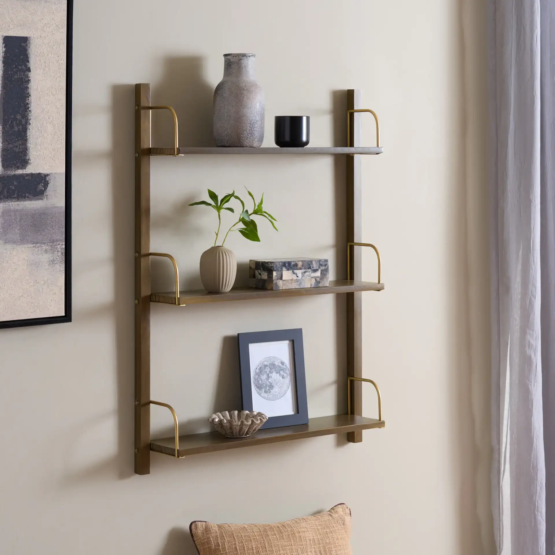 Brin Wall Shelf in Brown / Gold in a styled room