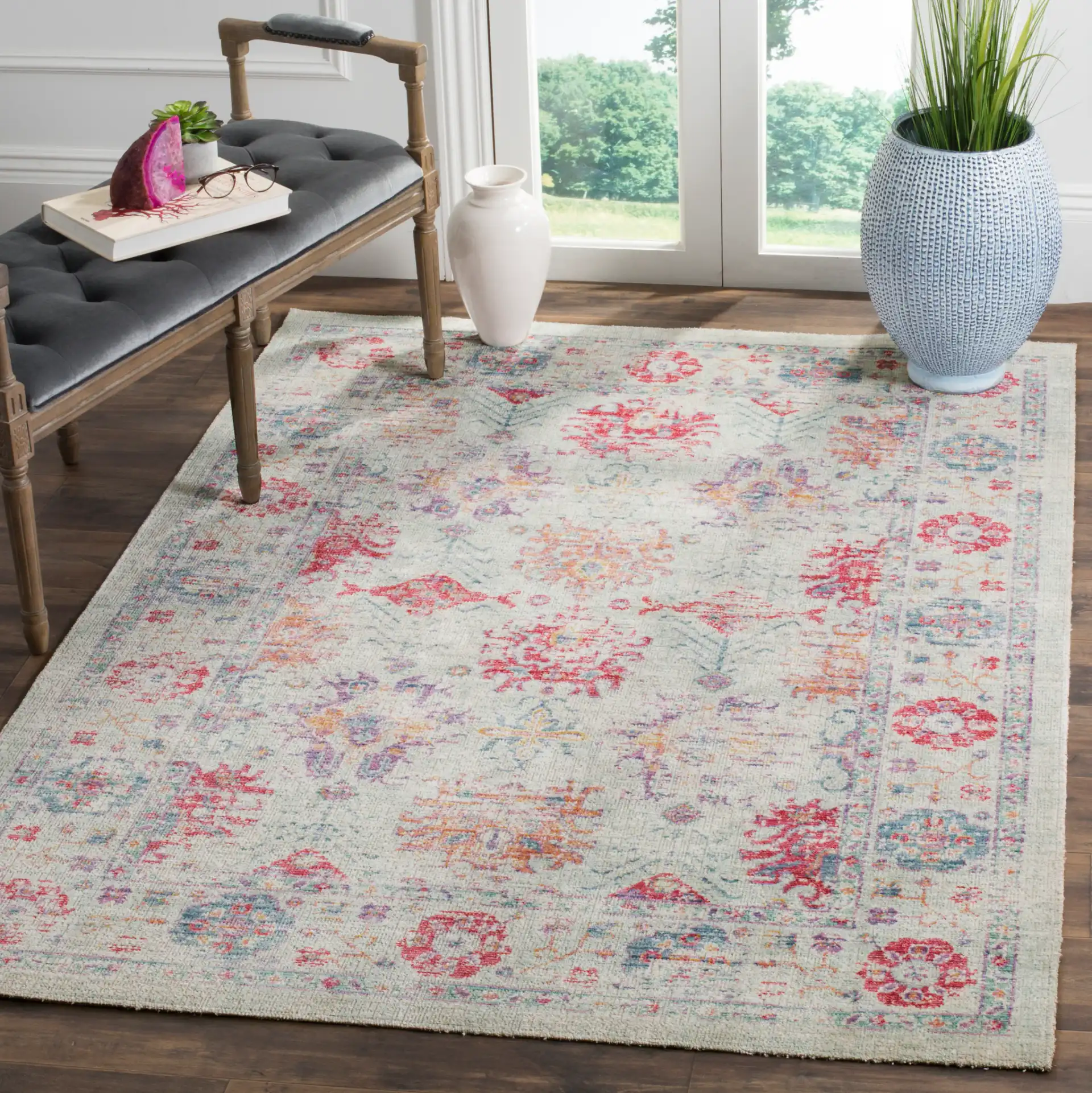 Windsor Antalya Distressed Bordered Rug in Ivory / Fuchsia in a styled room