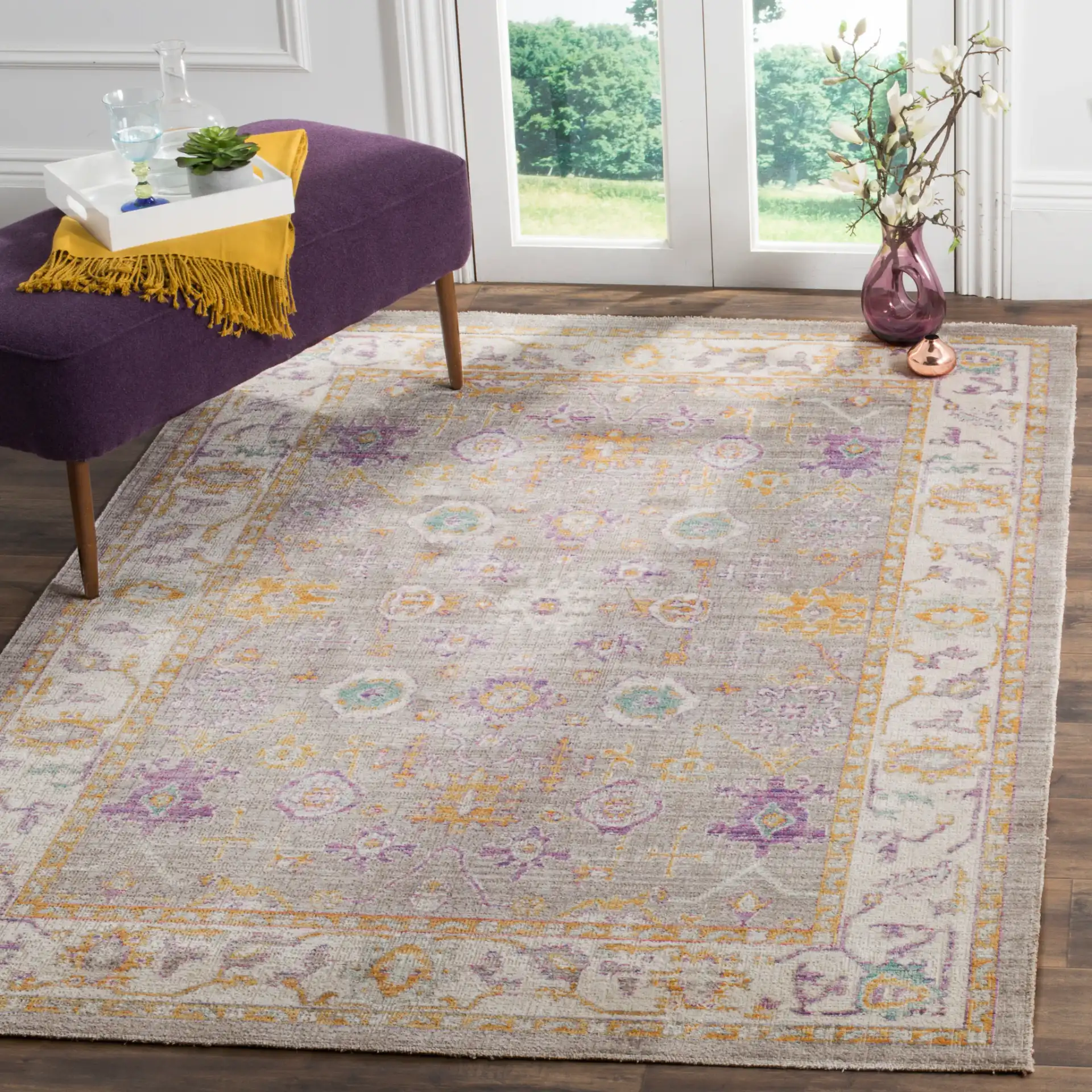 Windsor Bordered Medallion Rug in Gray / Cream in a styled room