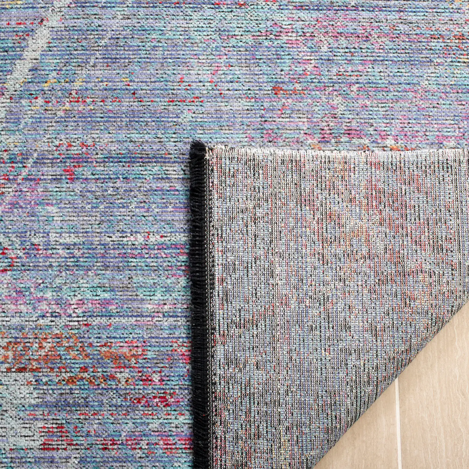 Windsor Grid Abstract Rug in Ivory / Aqua in a styled room