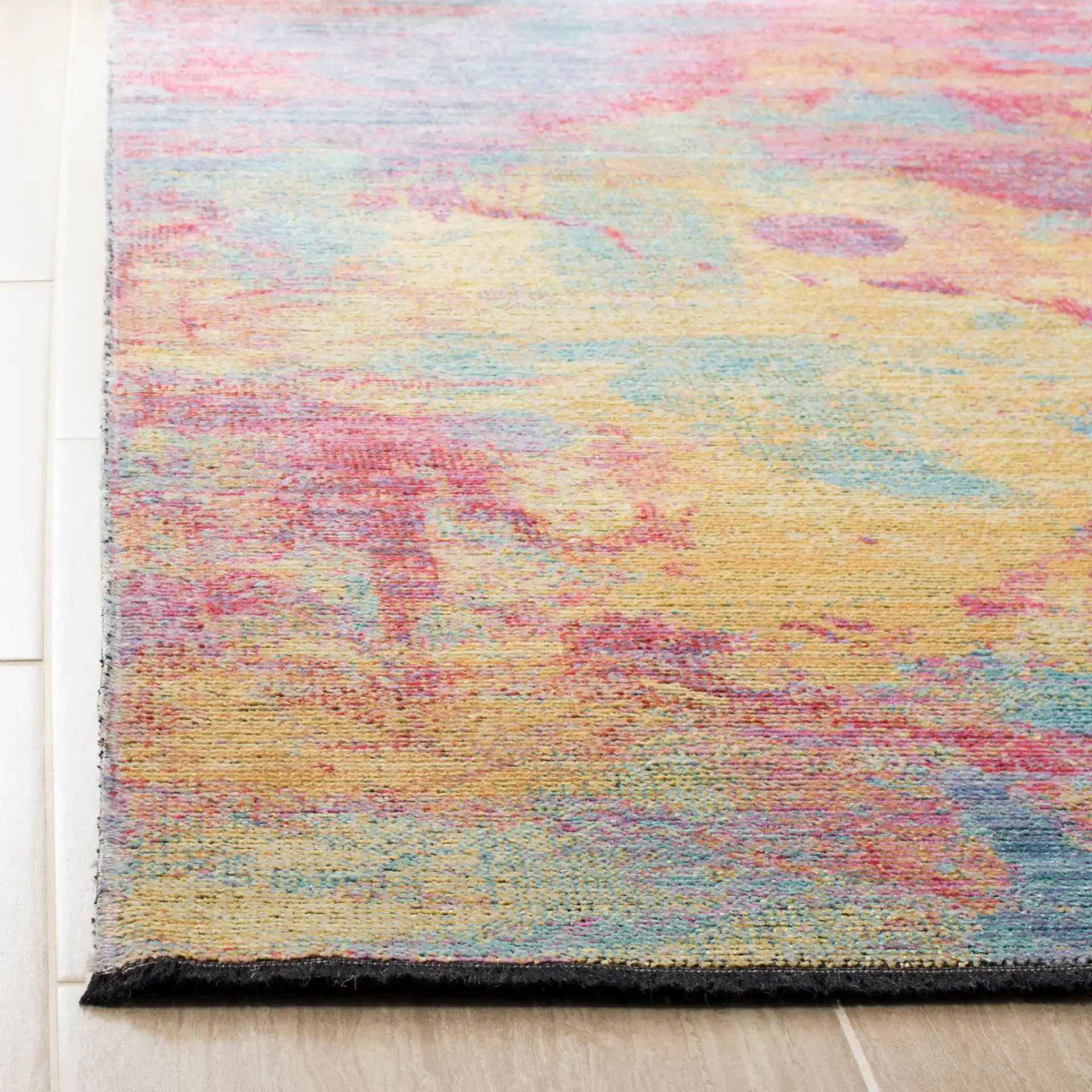Windsor Abstract Striated Rug in Fuchsia / Turquoise in a styled room