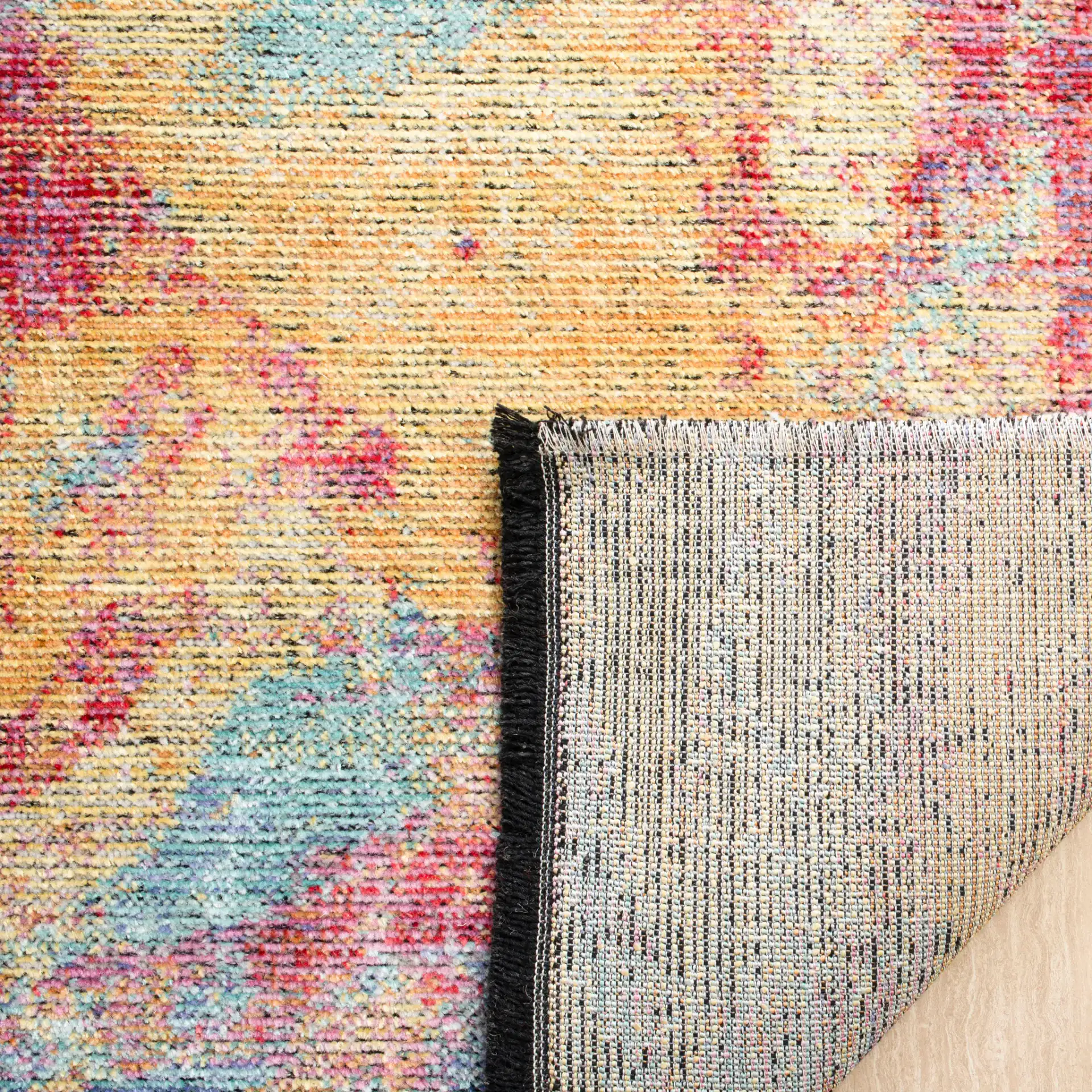 Windsor Abstract Striated Rug in Fuchsia / Turquoise in a styled room
