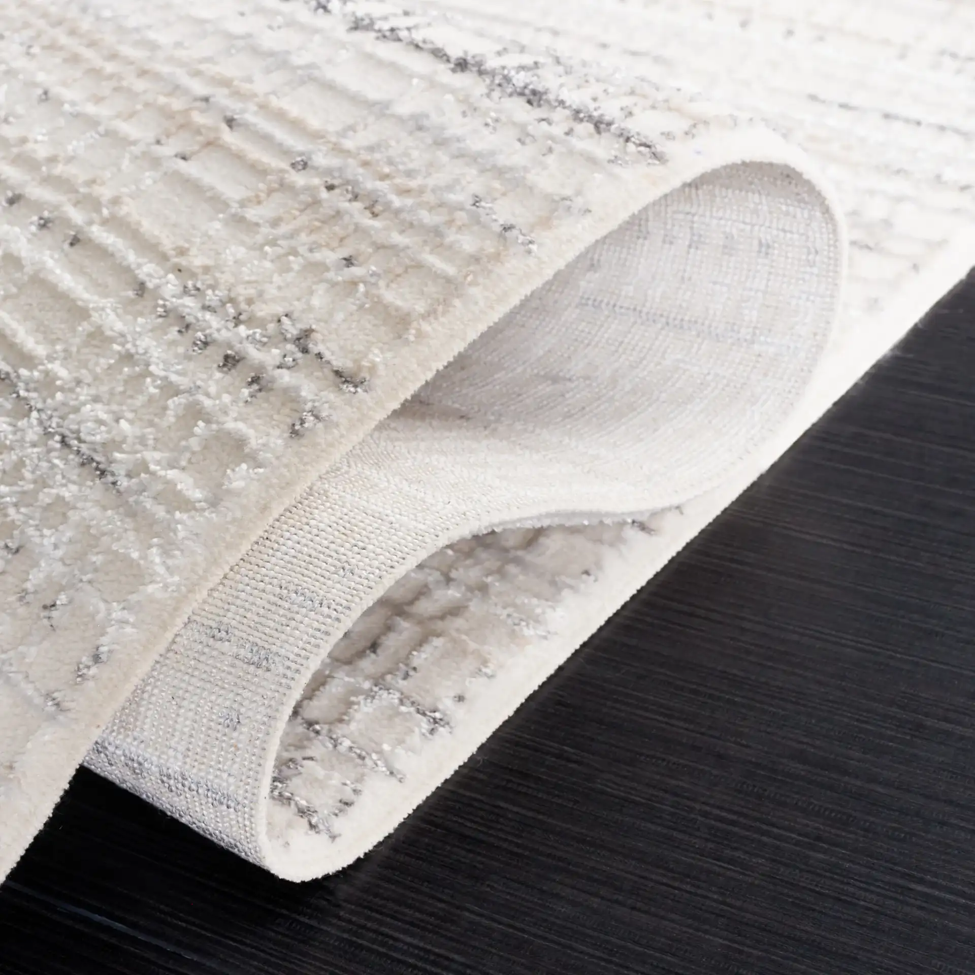 Whisper Linear Stripe Rug in Ivory / Gray in a styled room