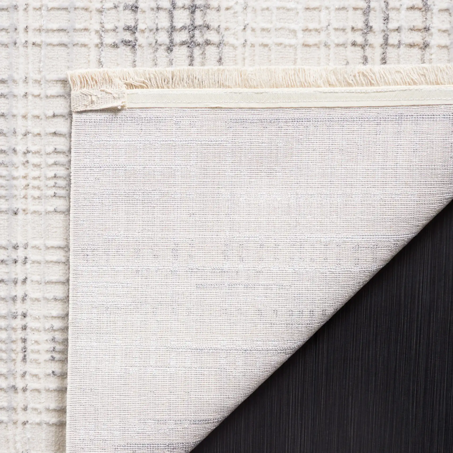 Whisper Linear Stripe Rug in Ivory / Gray in a styled room