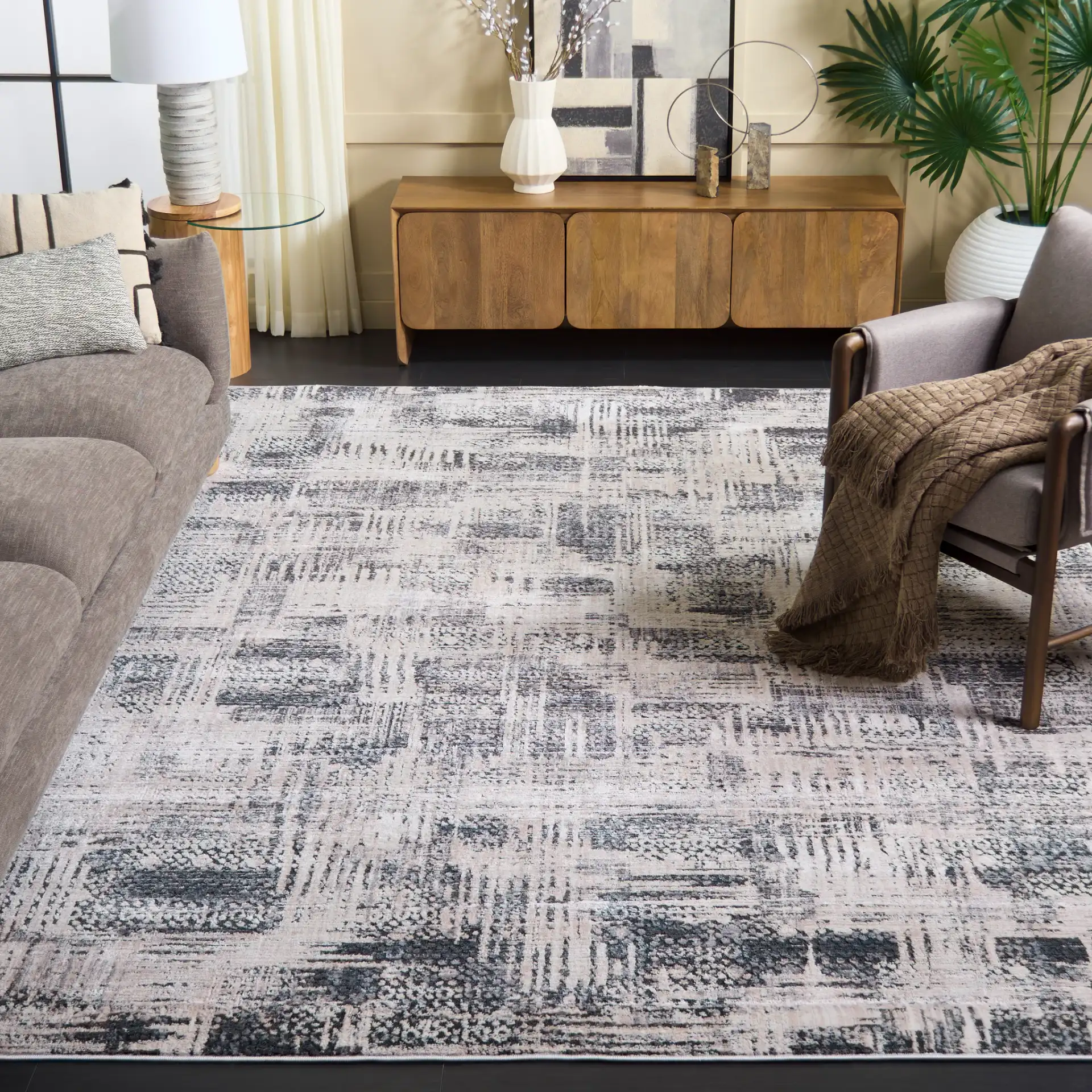 Whisper Abstract Grid Rug in Gray / Light Gray in a styled room