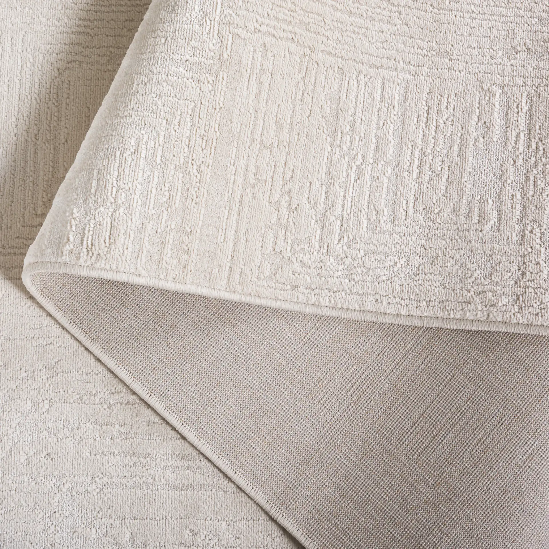 Whisper Concentric Square Rug in Beige in a styled room