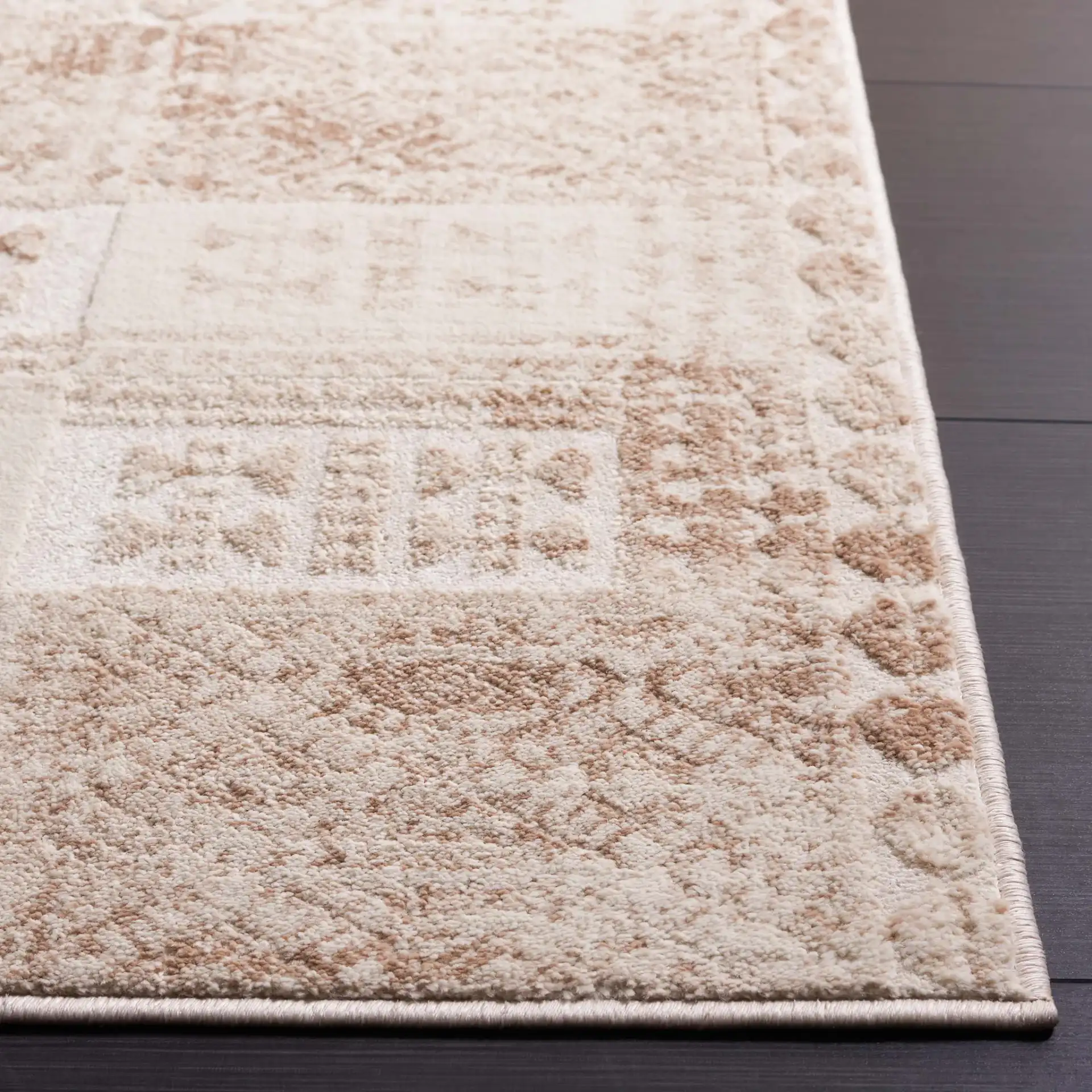 Whisper Distressed Patchwork Rug in Beige / Light Beige in a styled room