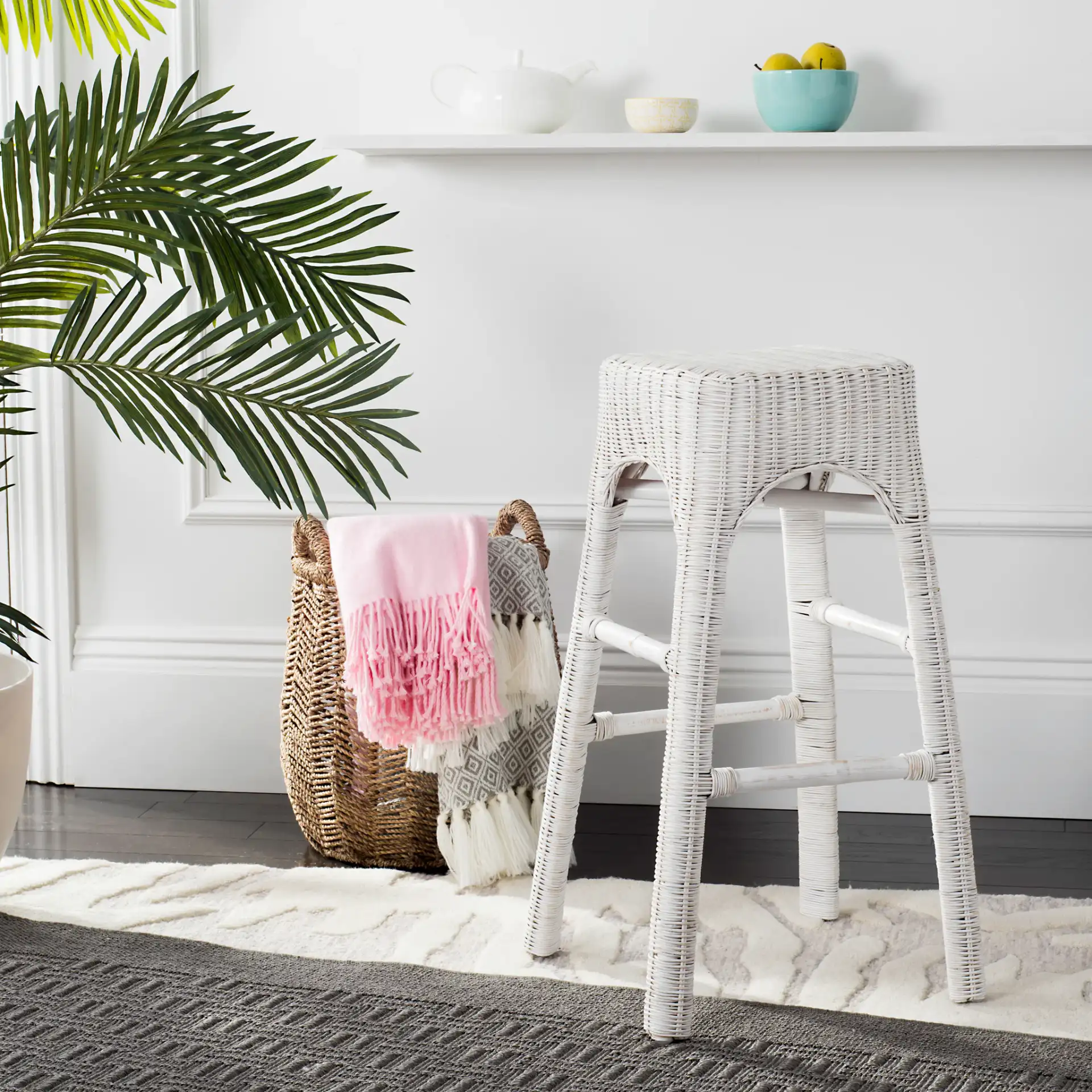 Percey Wicker Bar Stool in White in a styled room